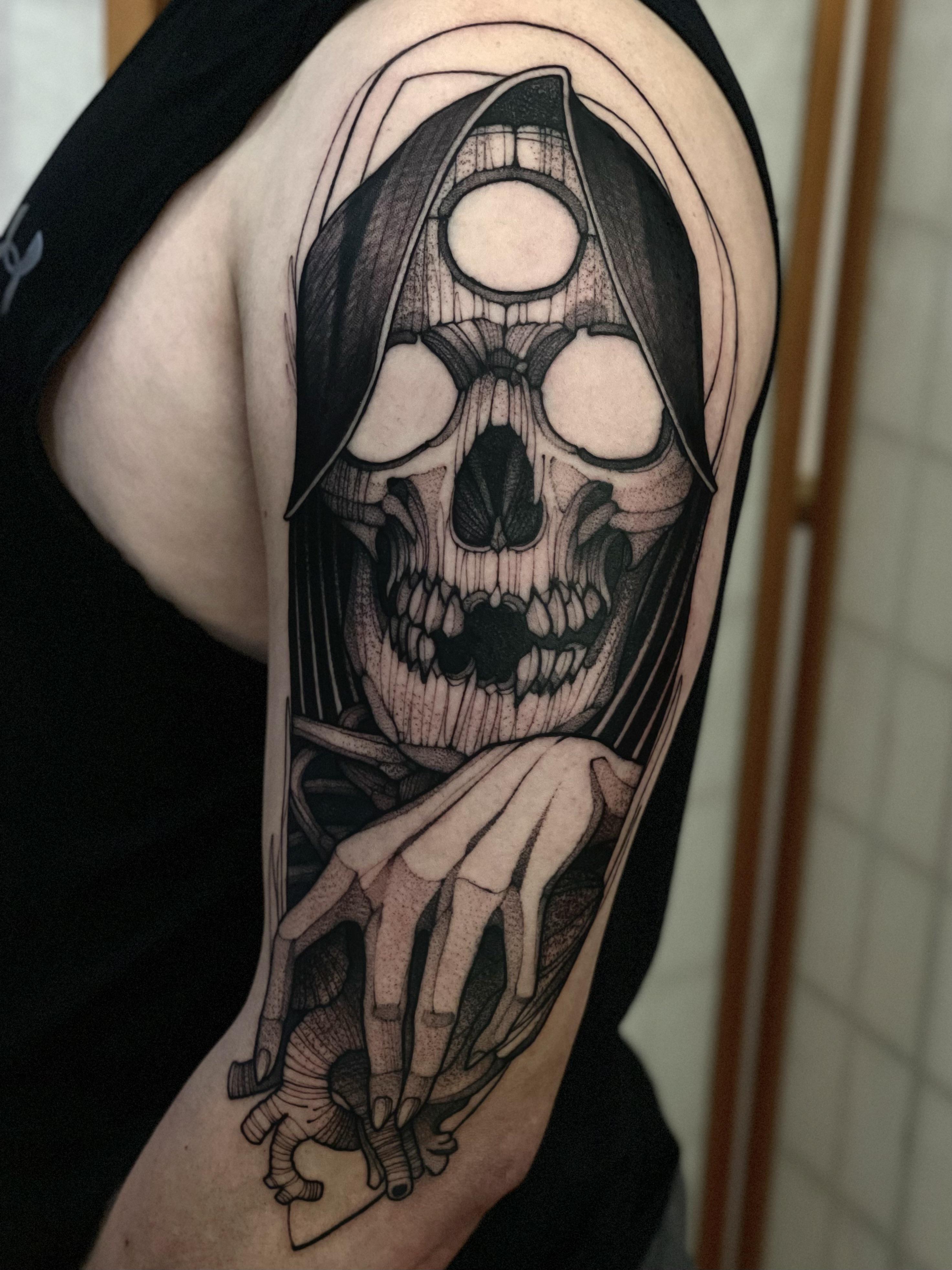 Blackwork reaper tattoo done by Max LaCroix at Akara Arts in Milwaukee