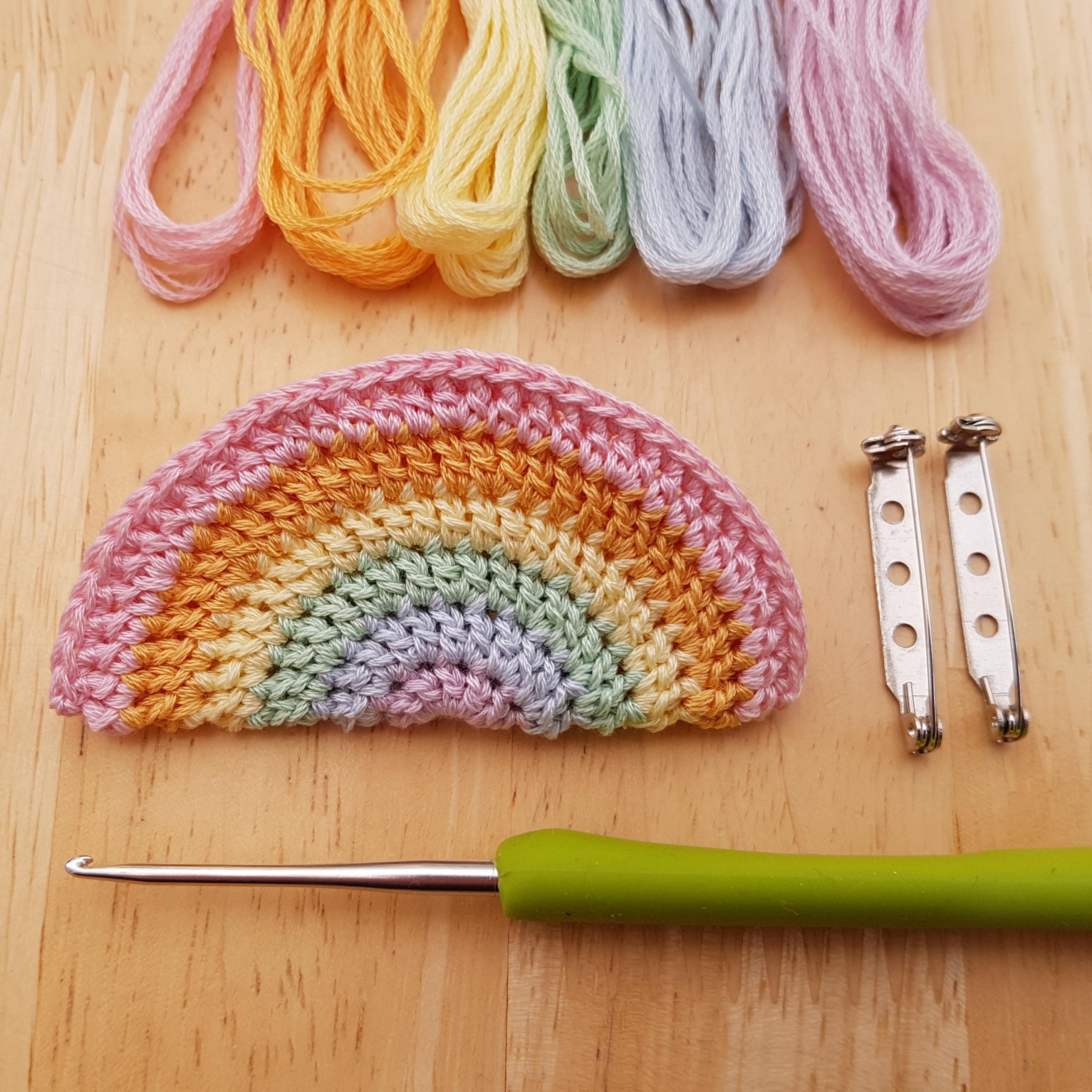 Made a little pastel rainbow badge from embroidery thread. r/crochet