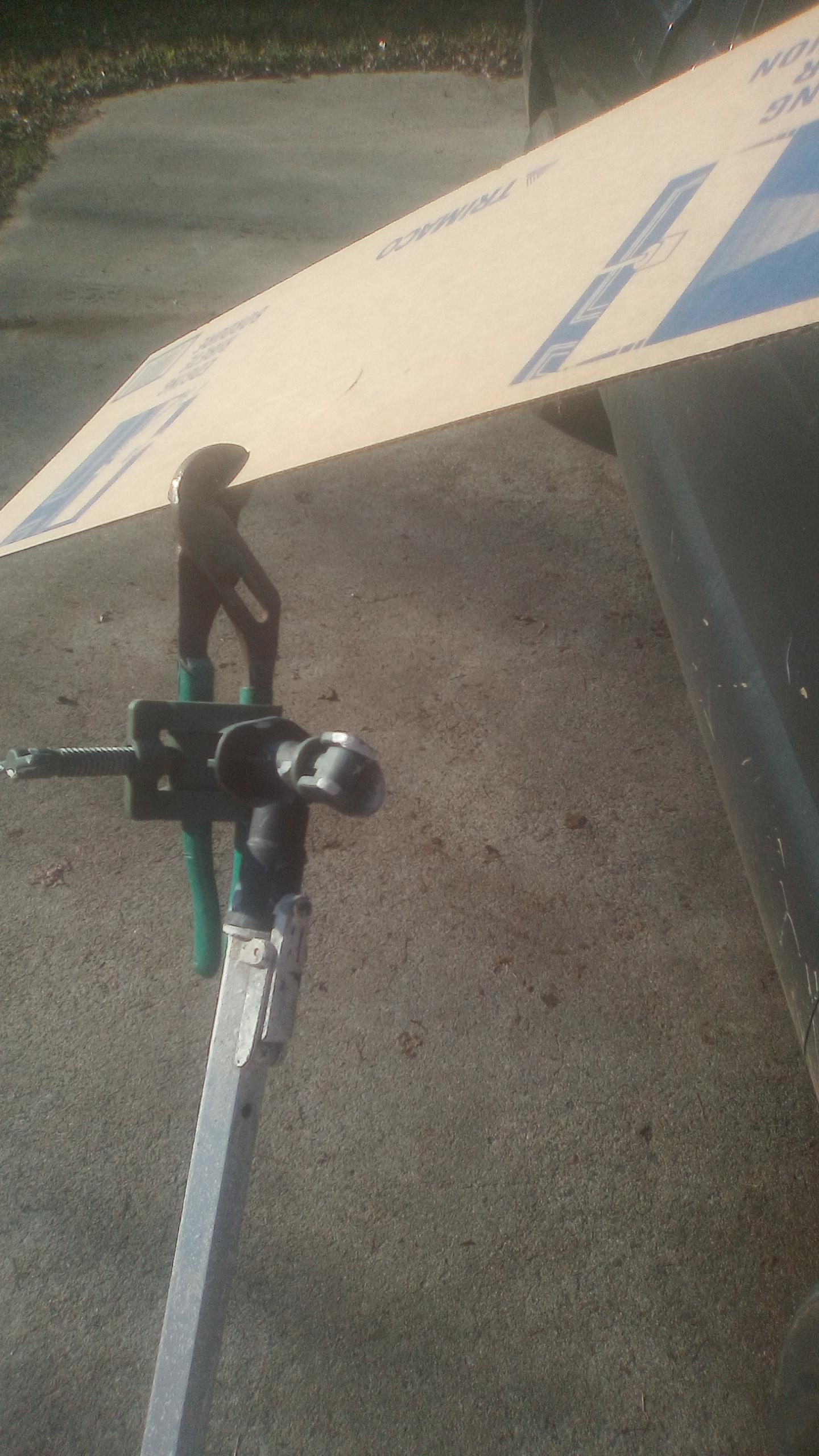 MacGyver paint shield holder. Roller pole, lockjaw, channel locks, and