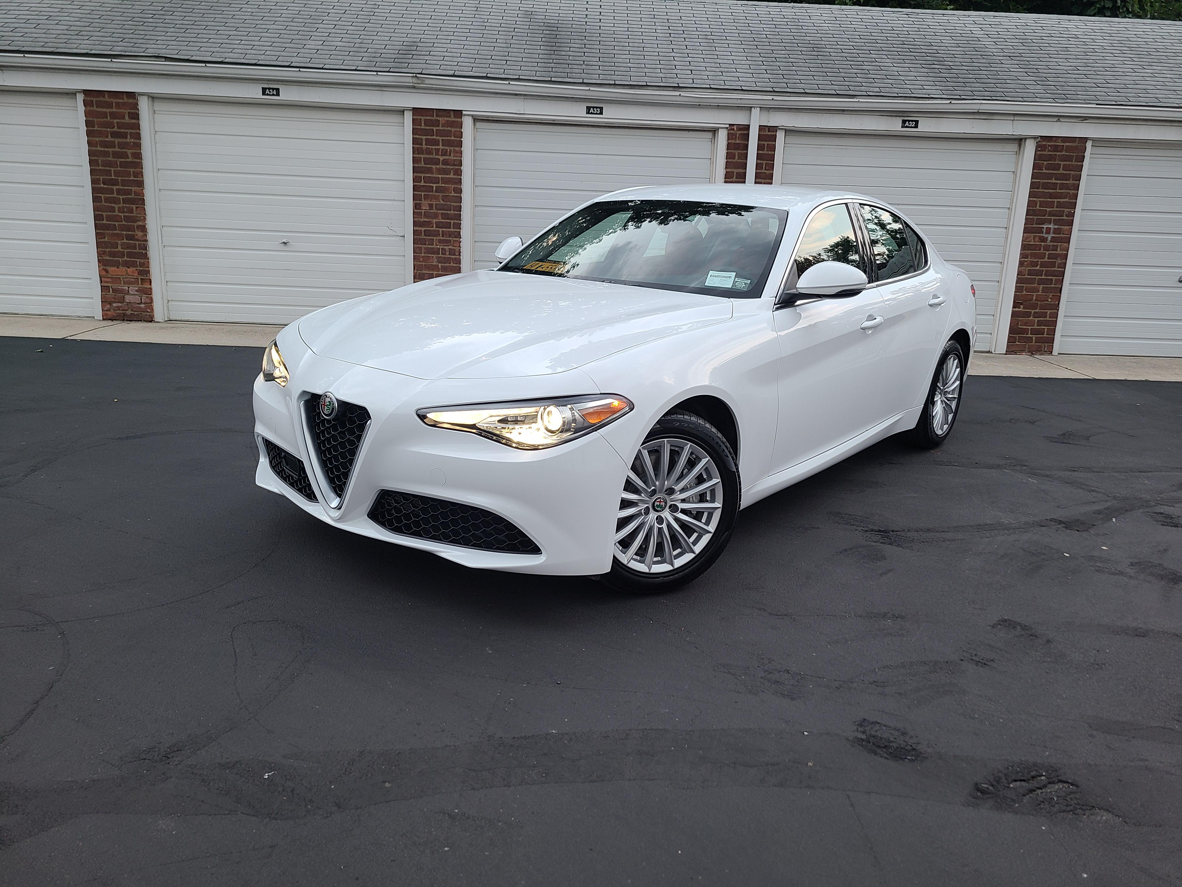Joined the Alfa Romeo Family Today. Alfa White and Red Interior 2021