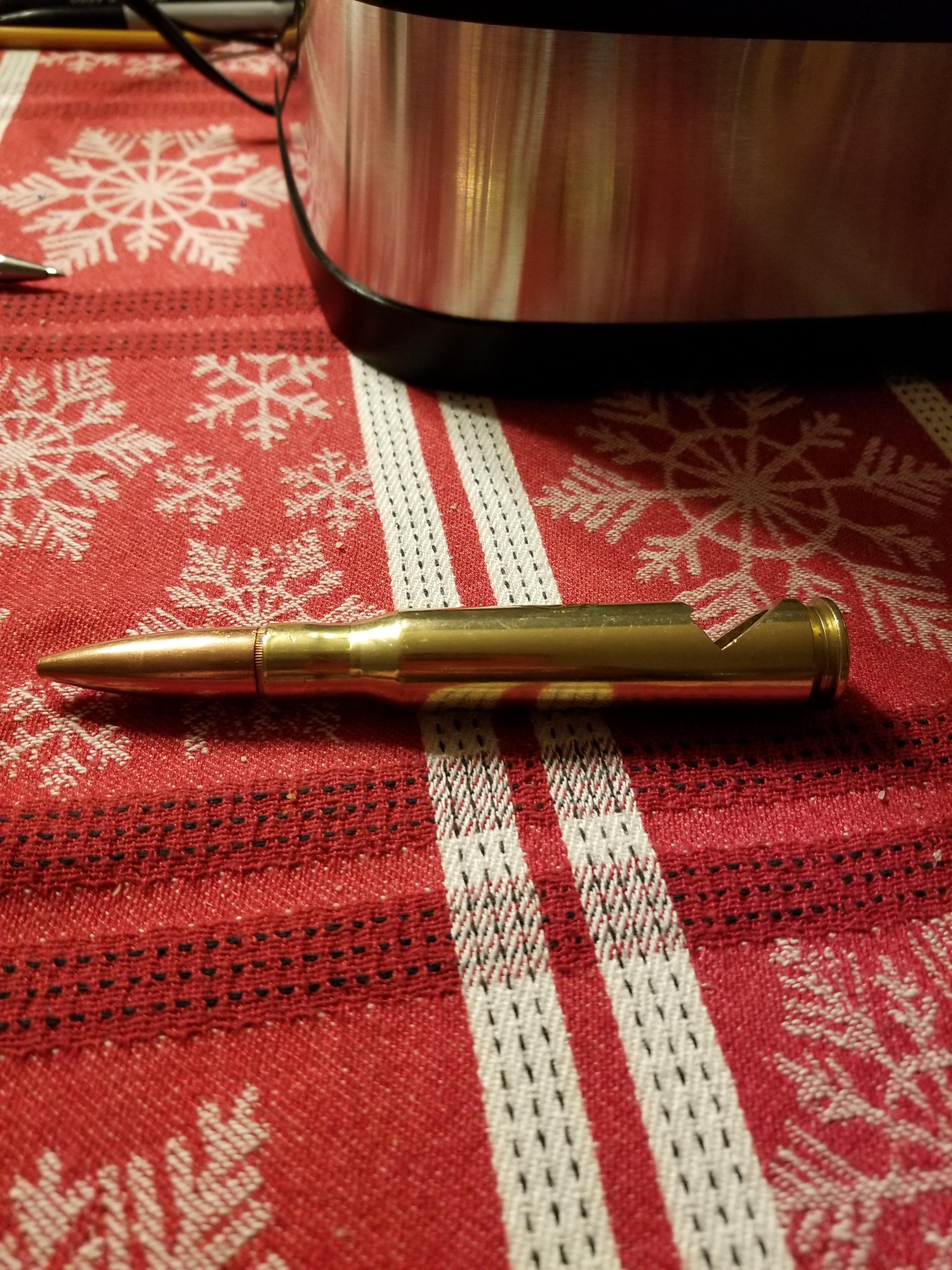 A bottle opener made from a bullet r/mildlyinteresting