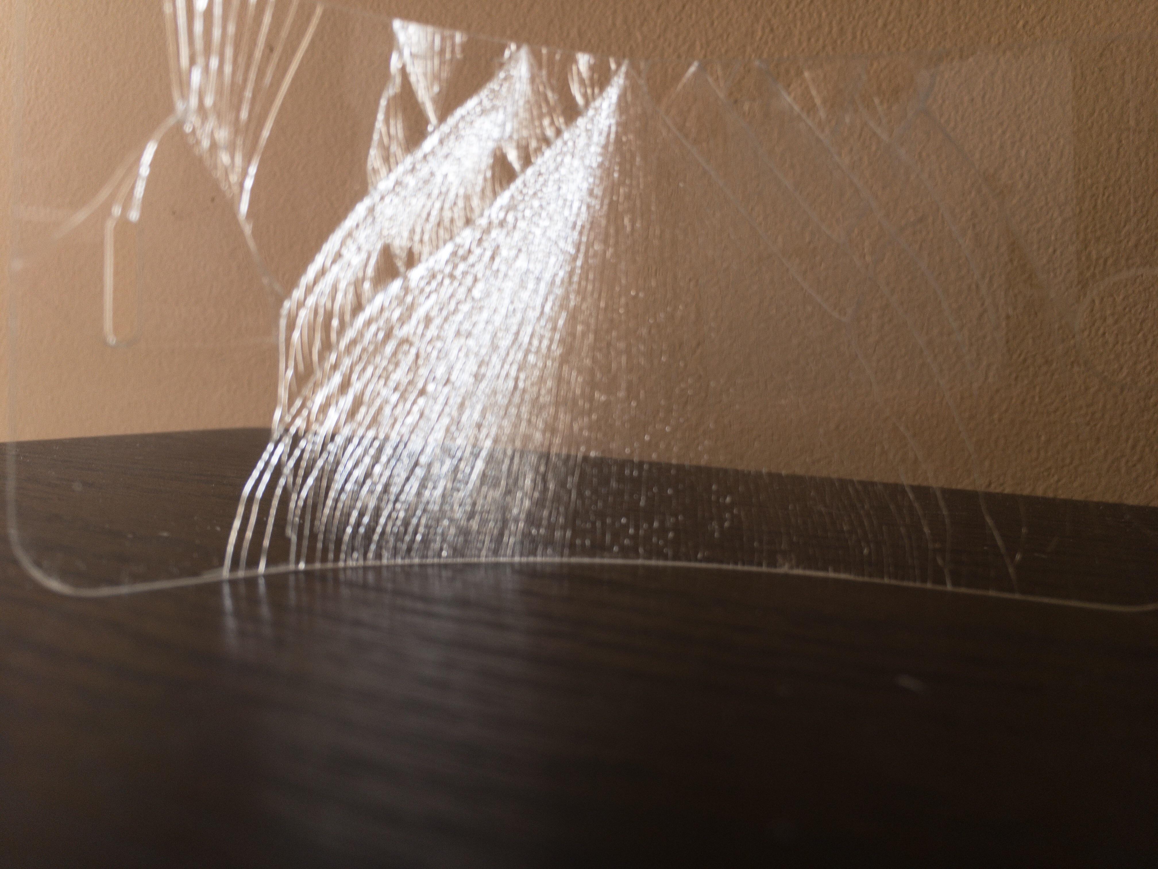 This broken tempered glass screen protector looks like a bunch of