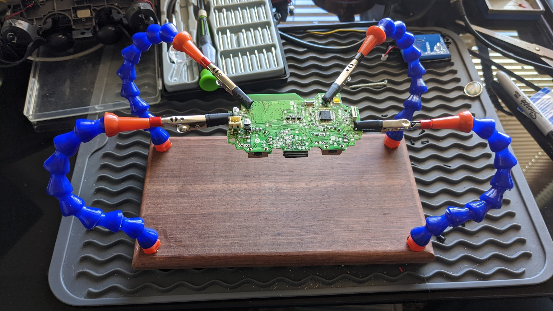 I made a circuit board holder out of Wenge wood and some coolant pipe