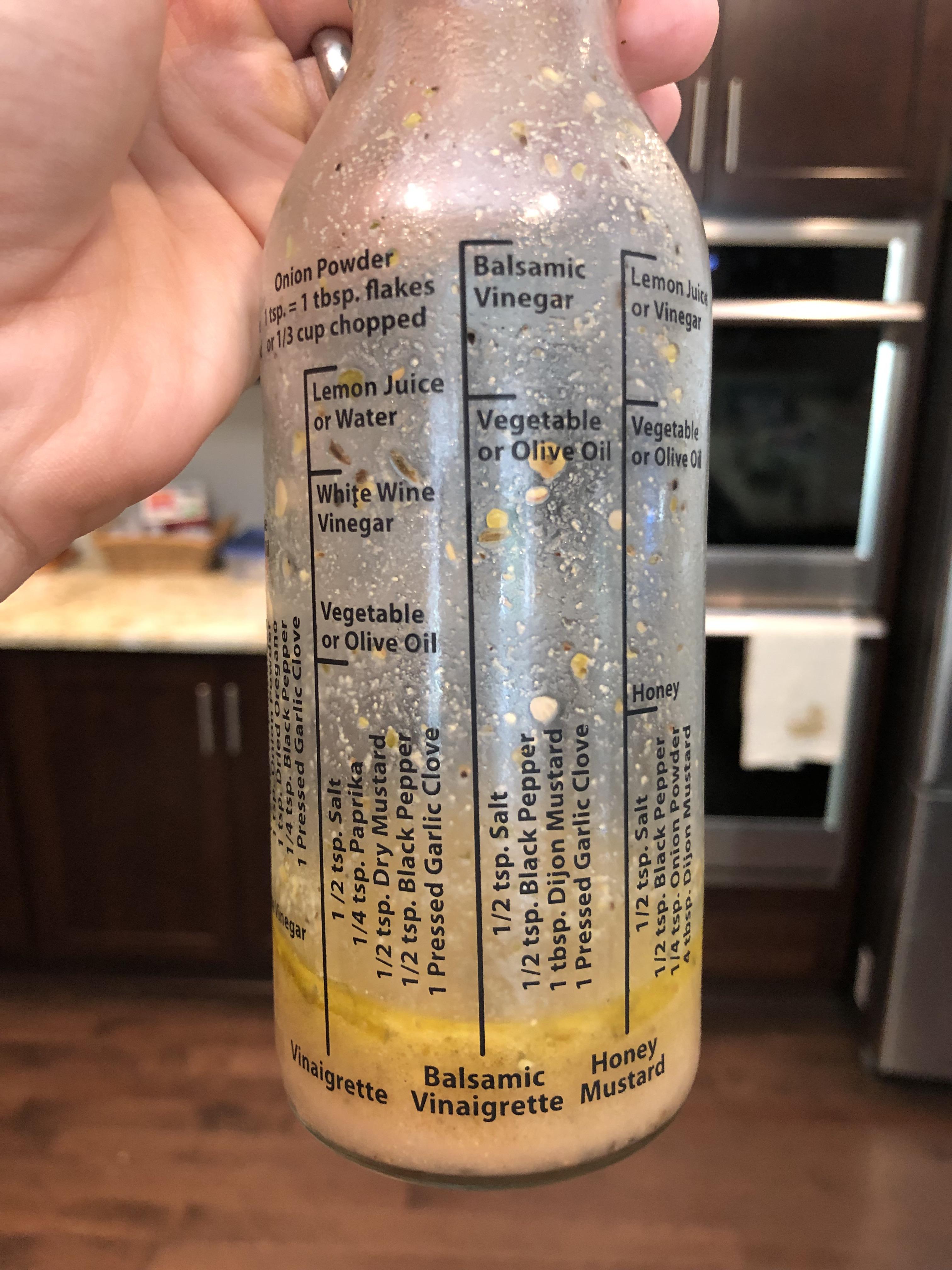 This reusable salad dressing bottle shows you how much of each