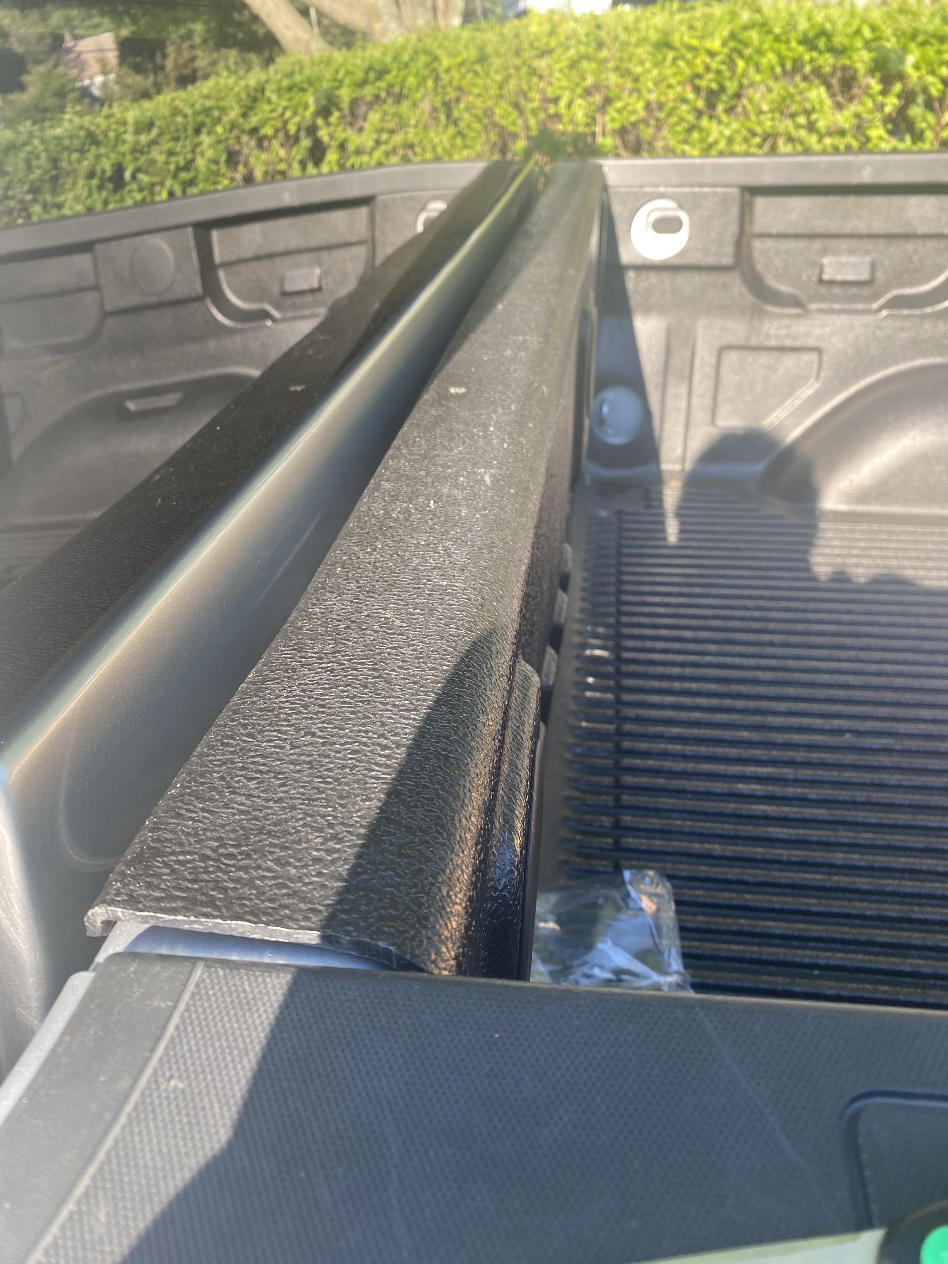 I’m installing a tonneau cover. The instructions say to put this sticky foam strip across the
