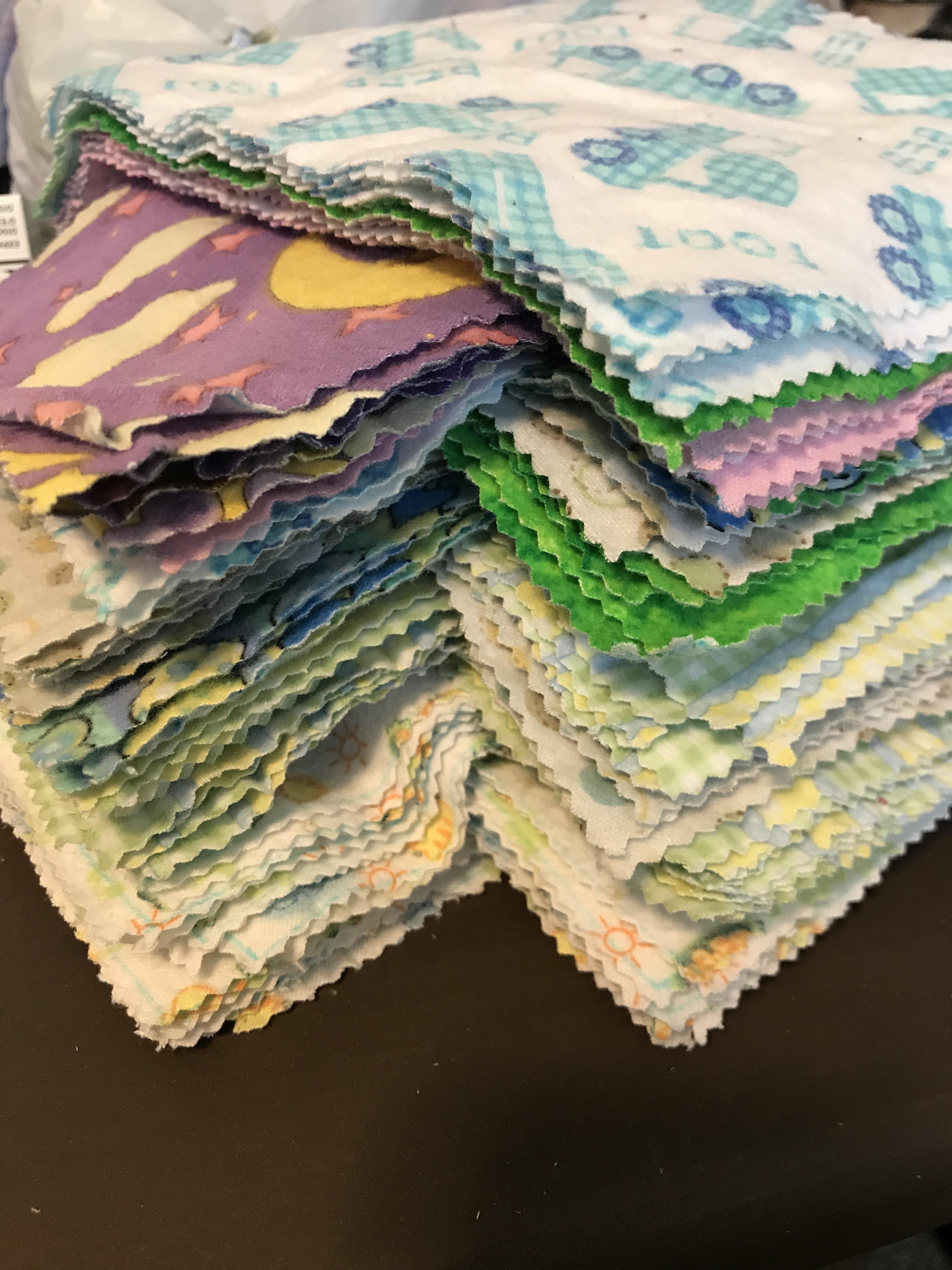 Finally done cutting! 100 cloth baby wipes from thrift store flannel