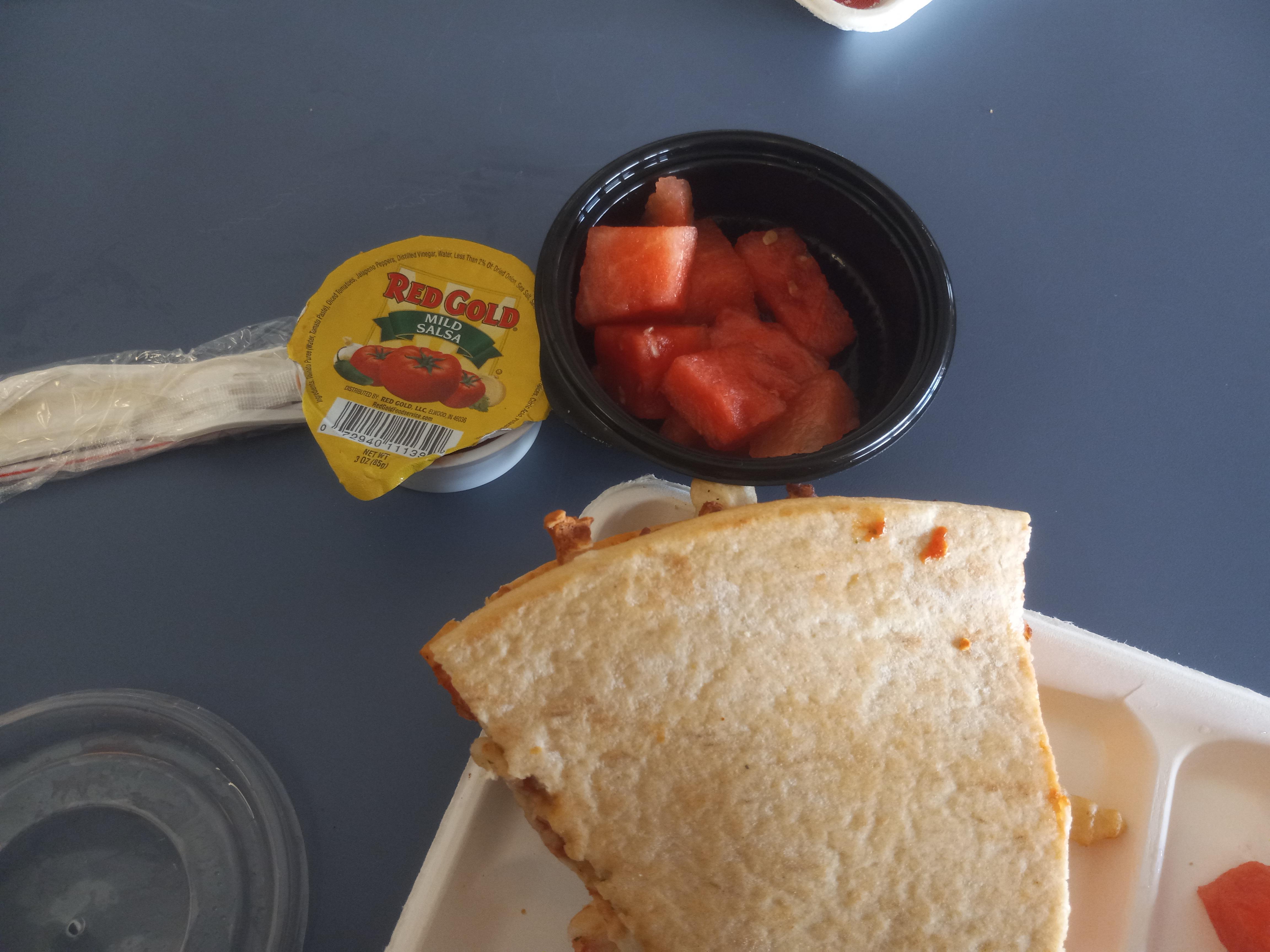 Red Gold Mild Salsa with water melon inside two pieces of pepperoni