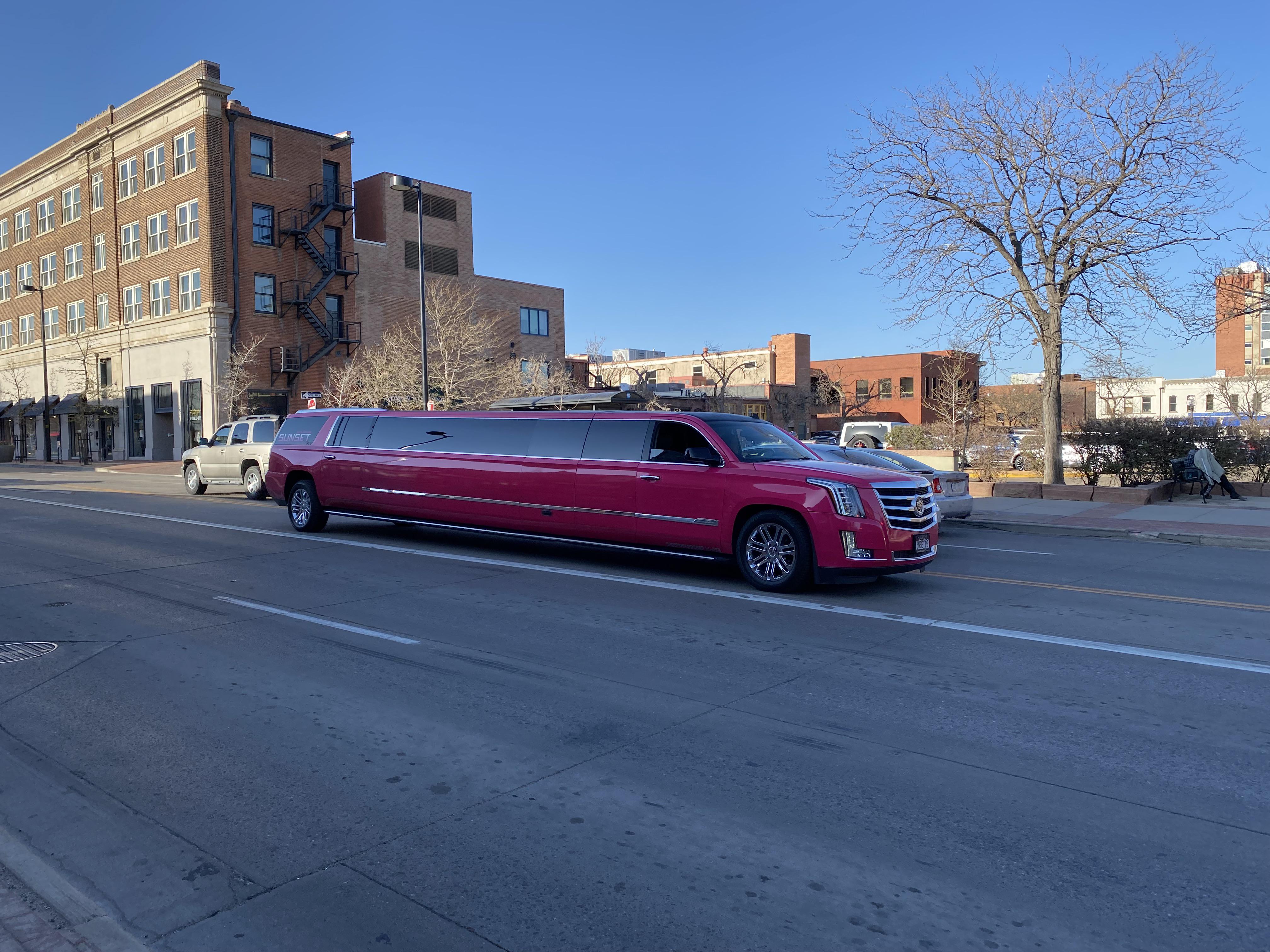 Pink Cadillac Escalade limousine. The official car of… regularcarreviews