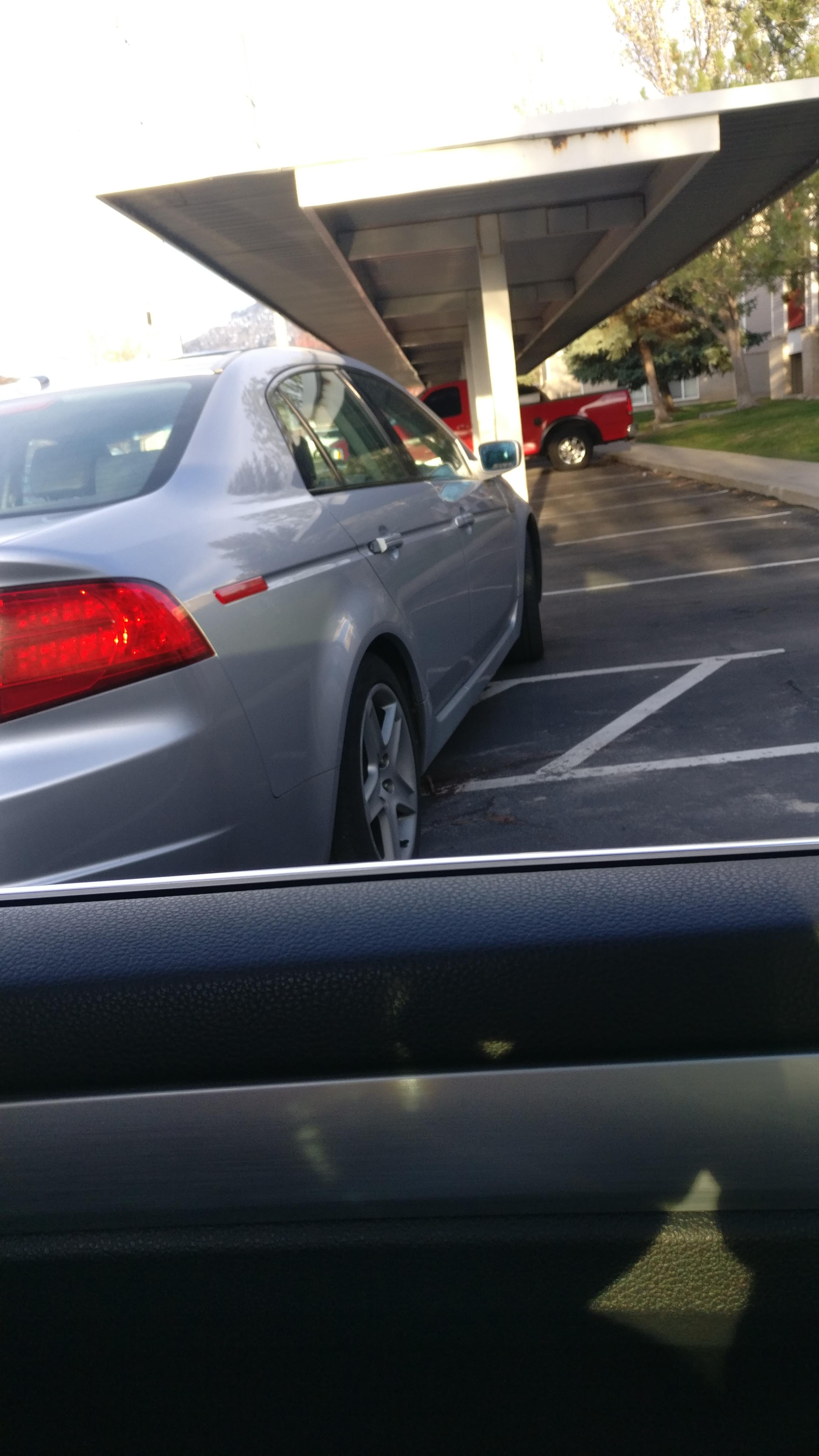Blocking two parking spots and a ramp my apartment complex. r