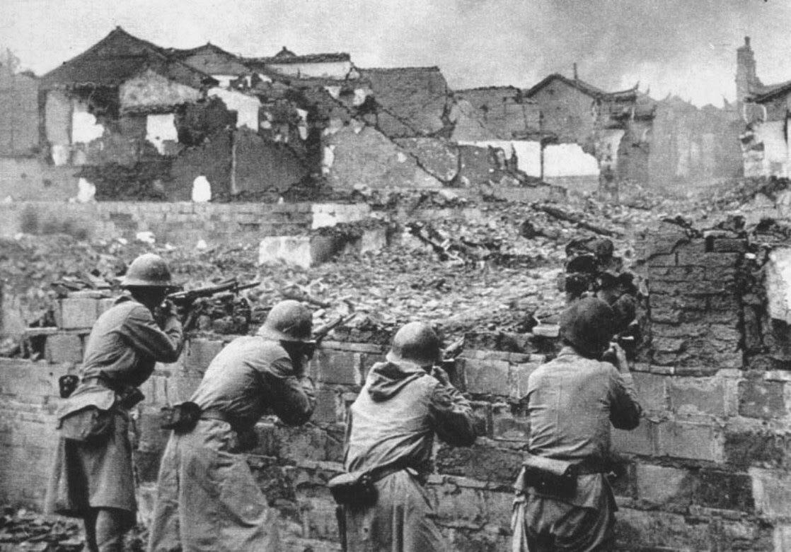 Japanese Soldiers in The Ruins Changsha City during the Ichi Go