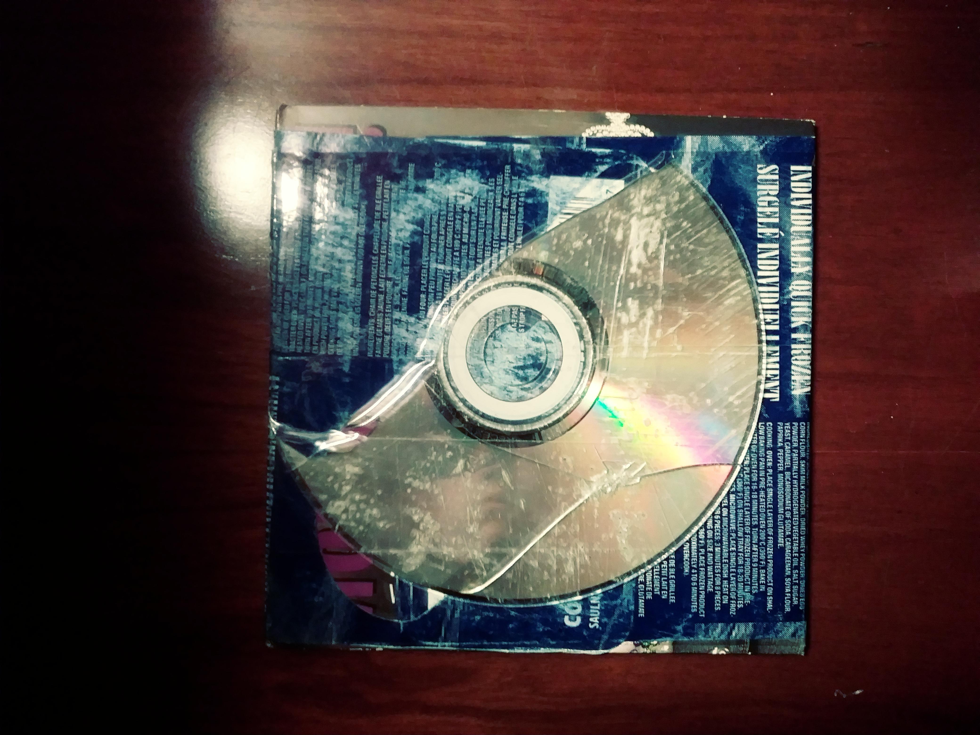 This gem of a CD that came in the mail (the broken CD is attached to