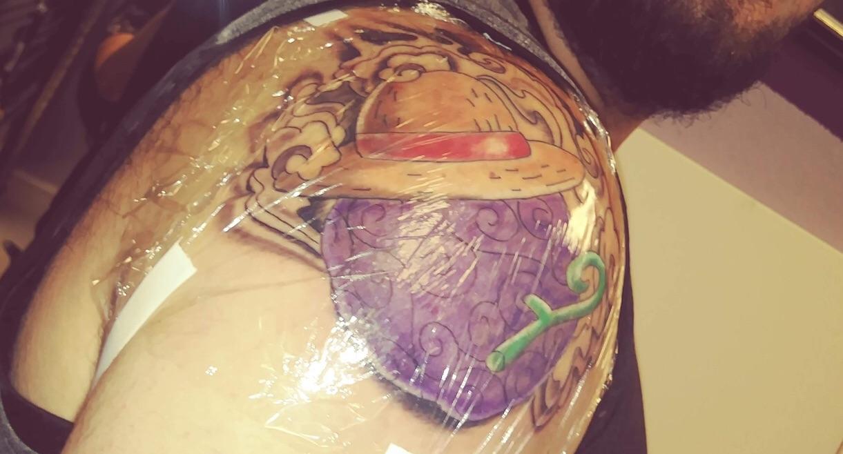 My friend got luffy’s devil fruit tattooed. OnePiece
