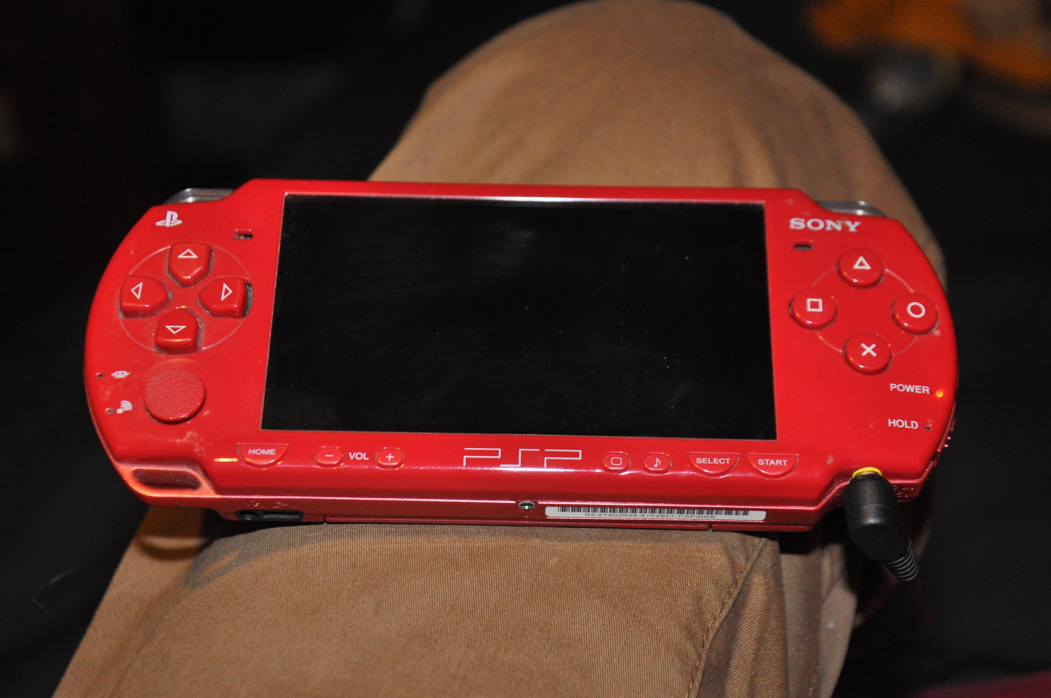I believe this is a Psp 2000 Slim Deep Red from 2007? How much would