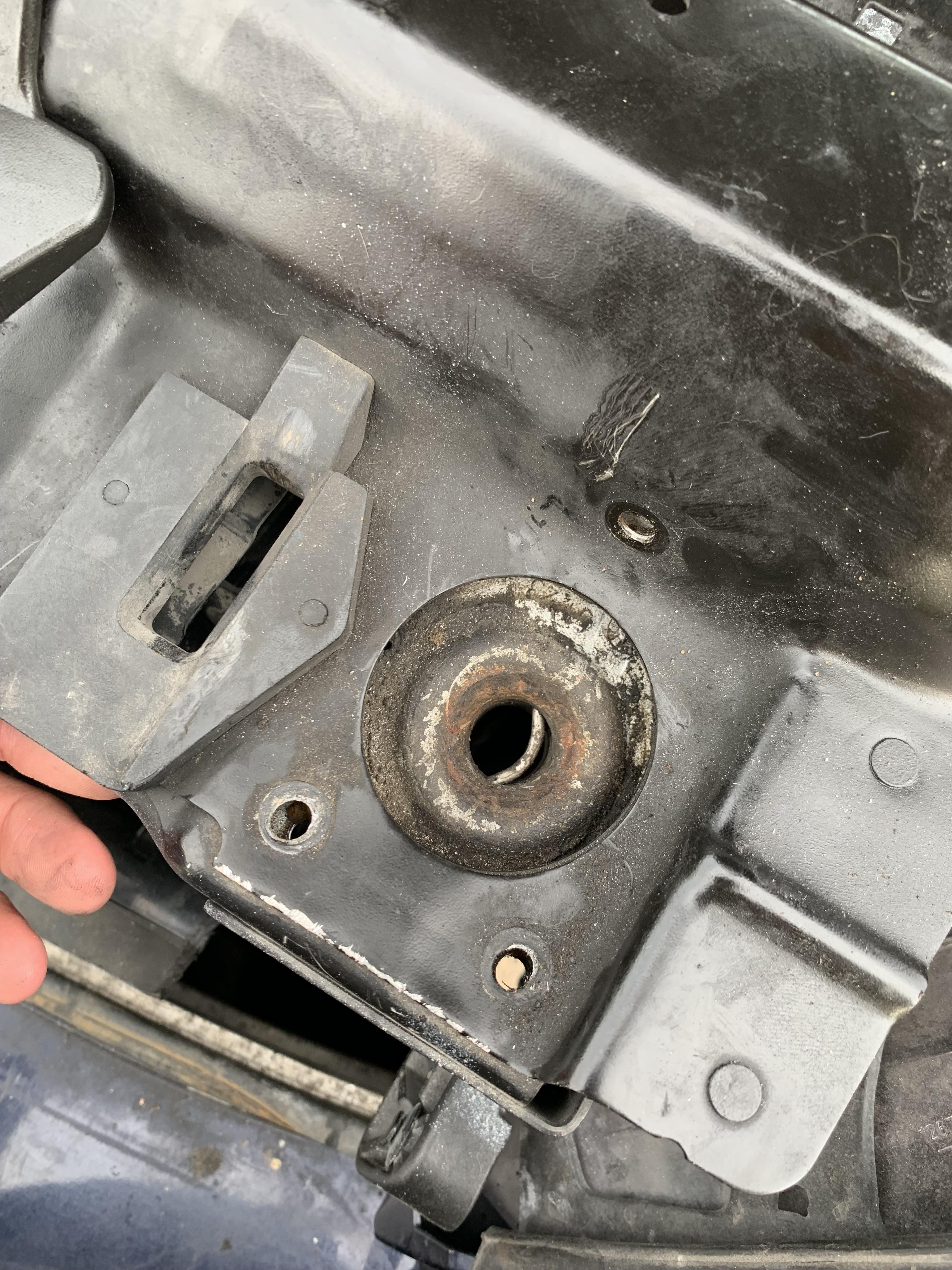 How to remove this hood latch? Had to sawzaw it because the top springs