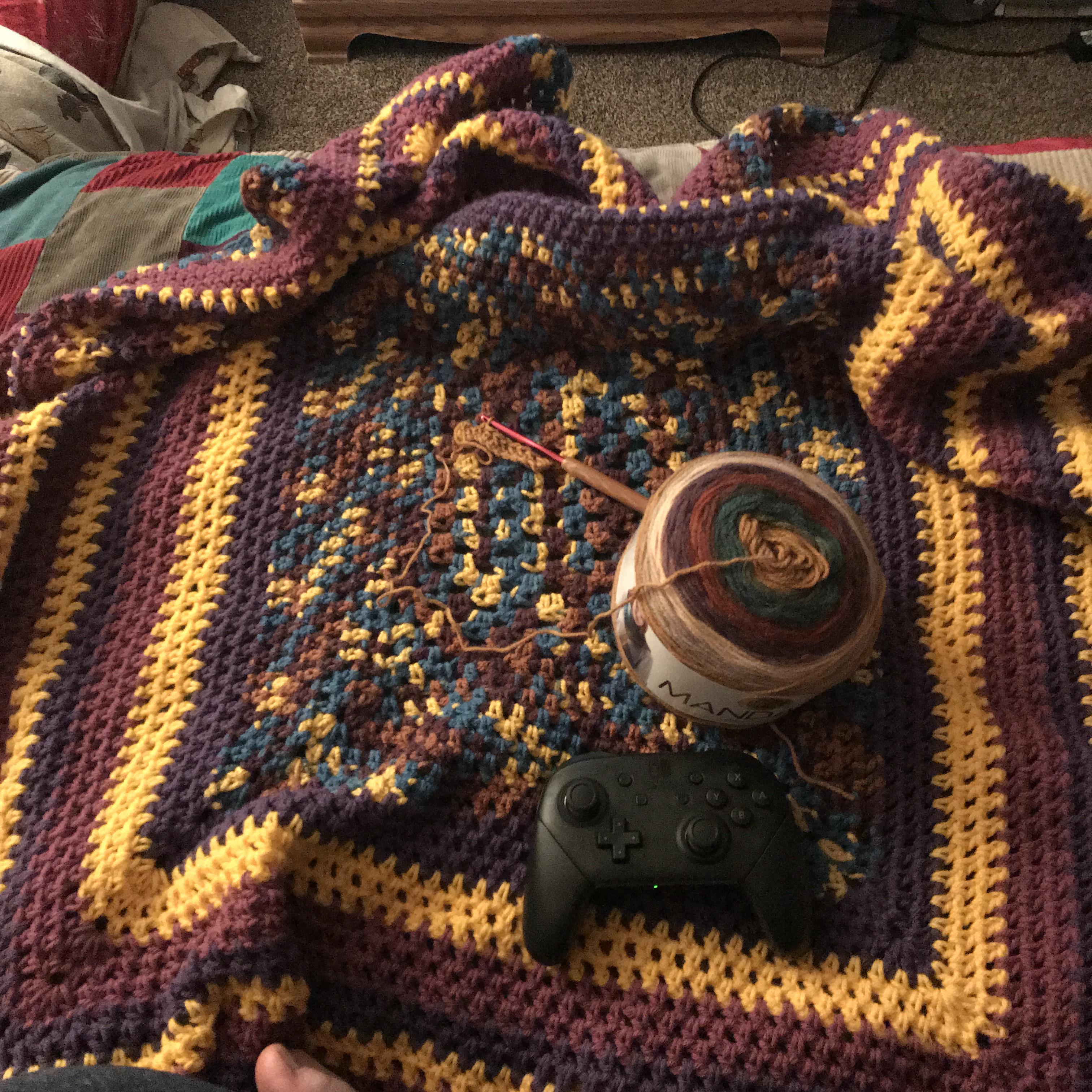 Blanket I crocheted while waiting for games in DBD. What do you do to