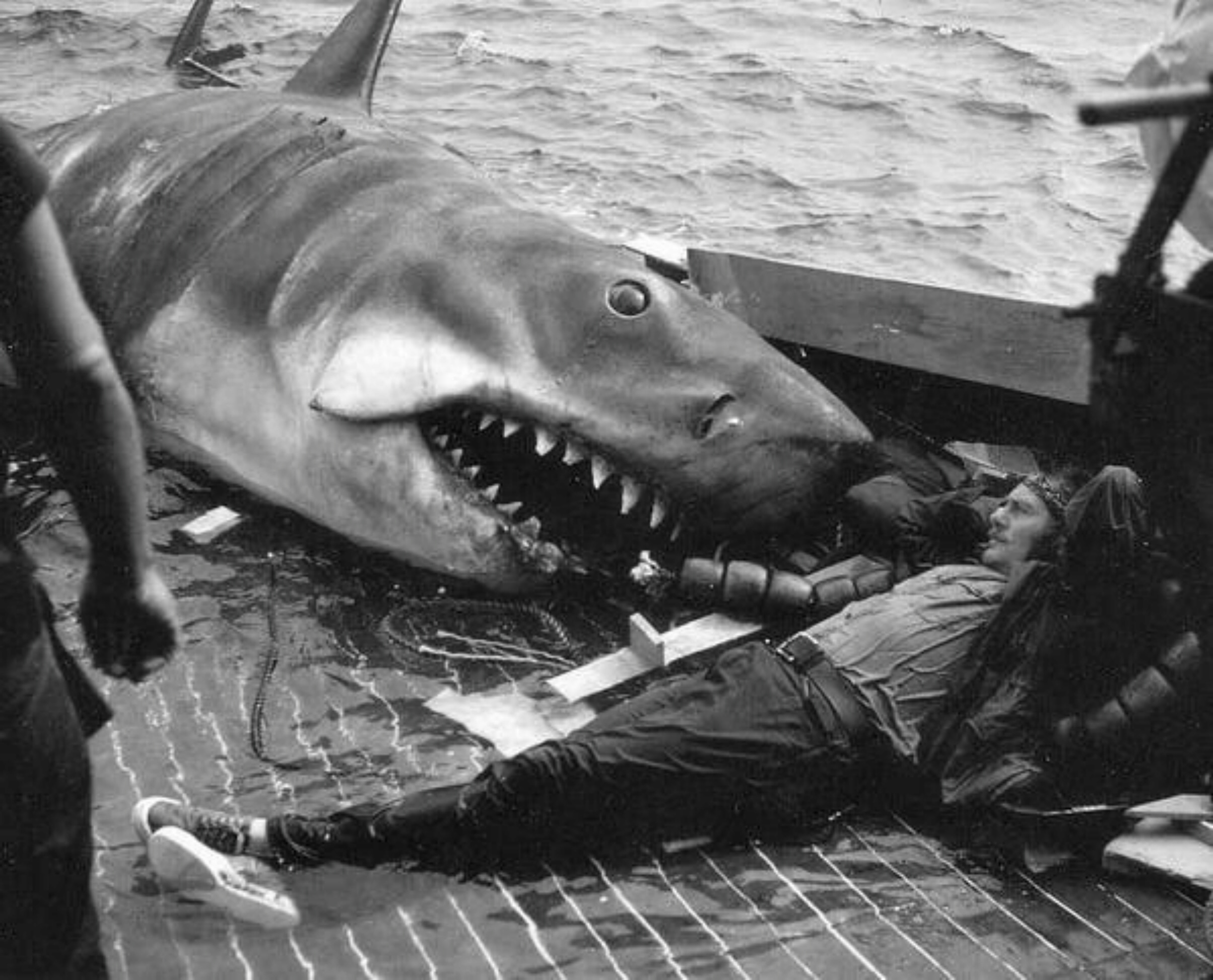 Robert Shaw kicking back with Bruce the Shark during the filming of
