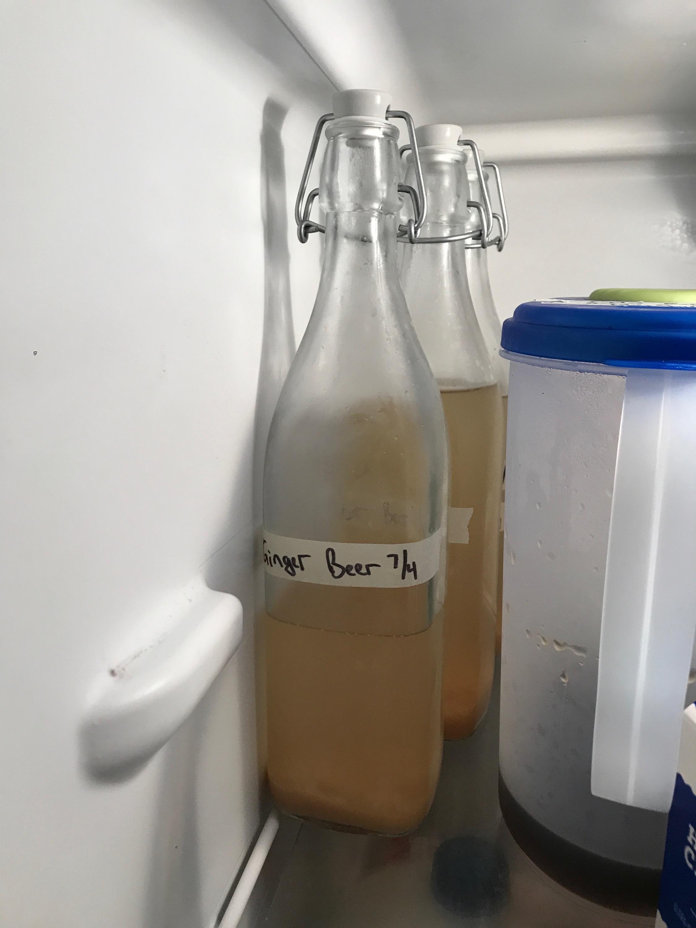 How to get less sediment in ginger beer/kill fermentation after