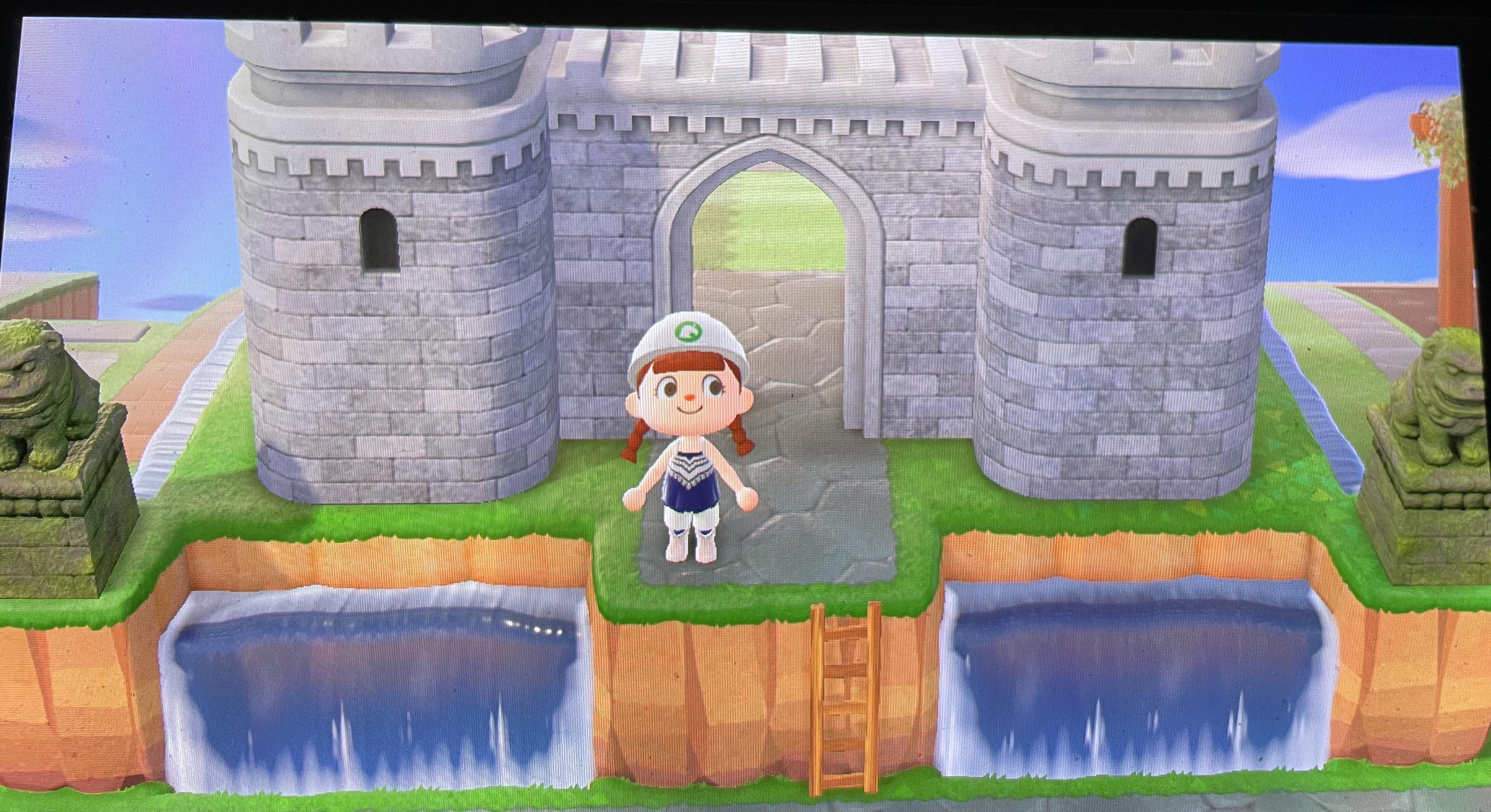 My castle has a waterfall moat and stone lion dogs for gargoyles r