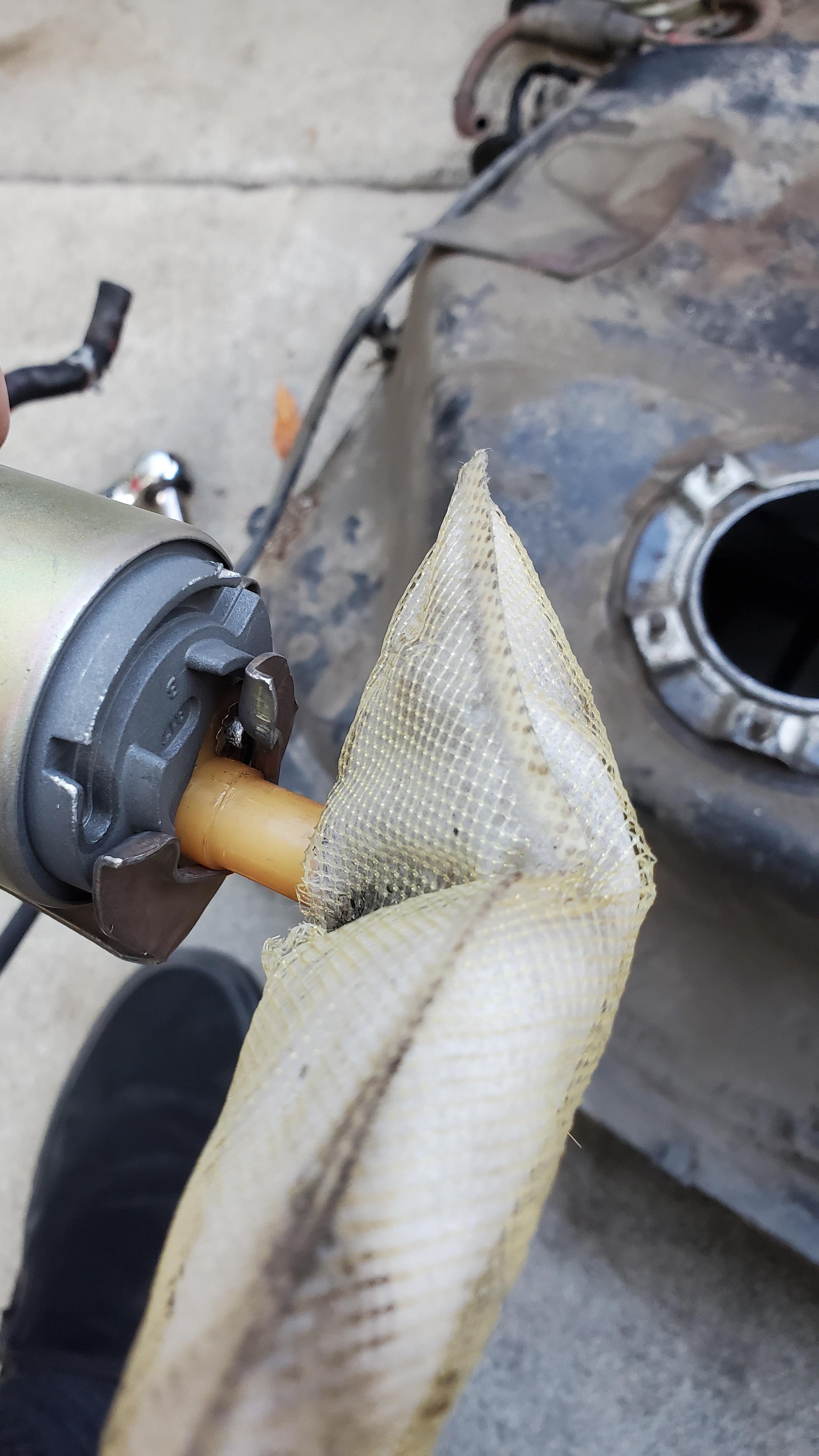 Dropped the fuel tank on the ef today. Backward ripped fuel pump sock