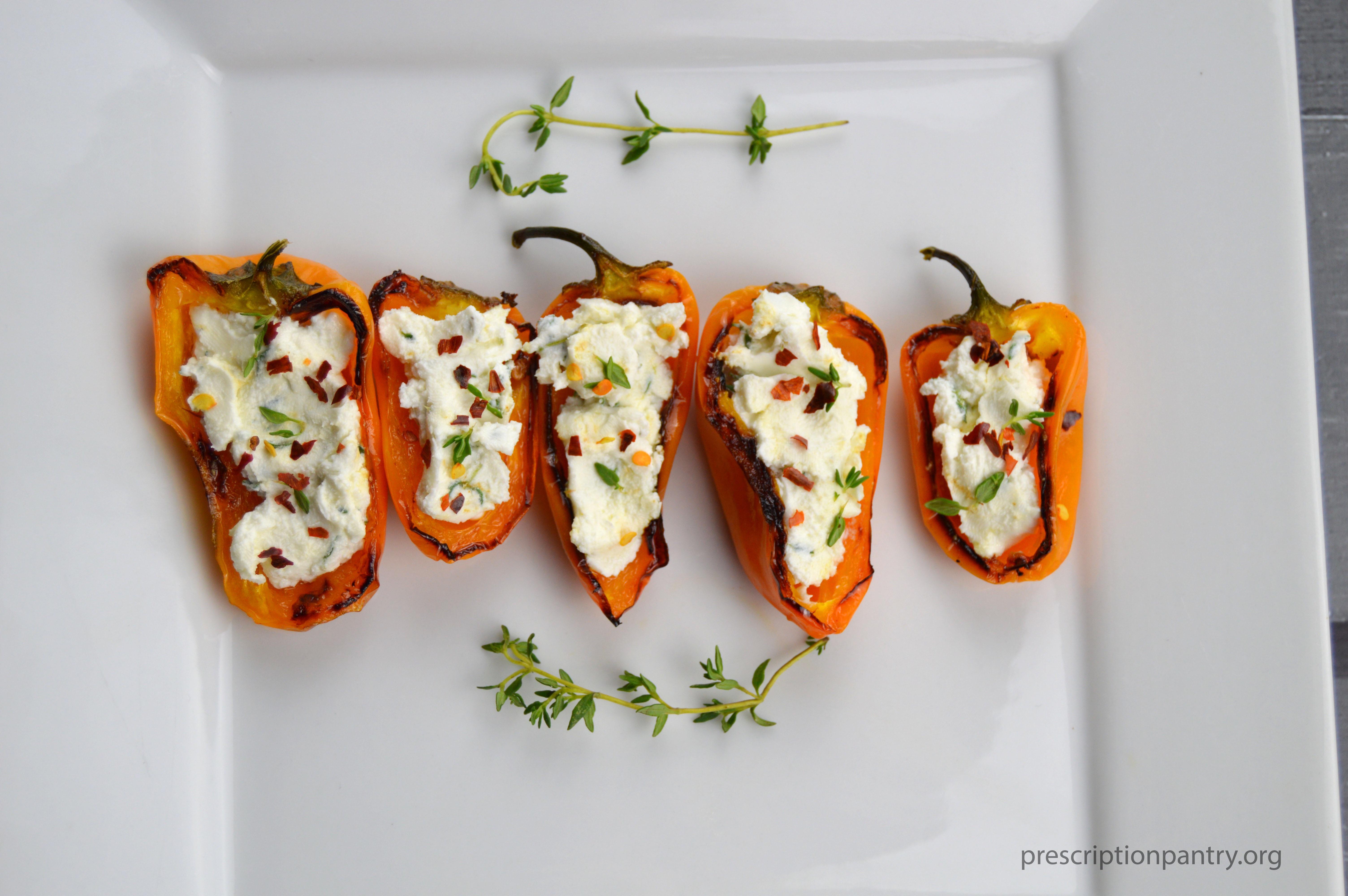 [OC] Blistered mini sweet peppers stuffed with goat cheese and thyme r/FoodPorn