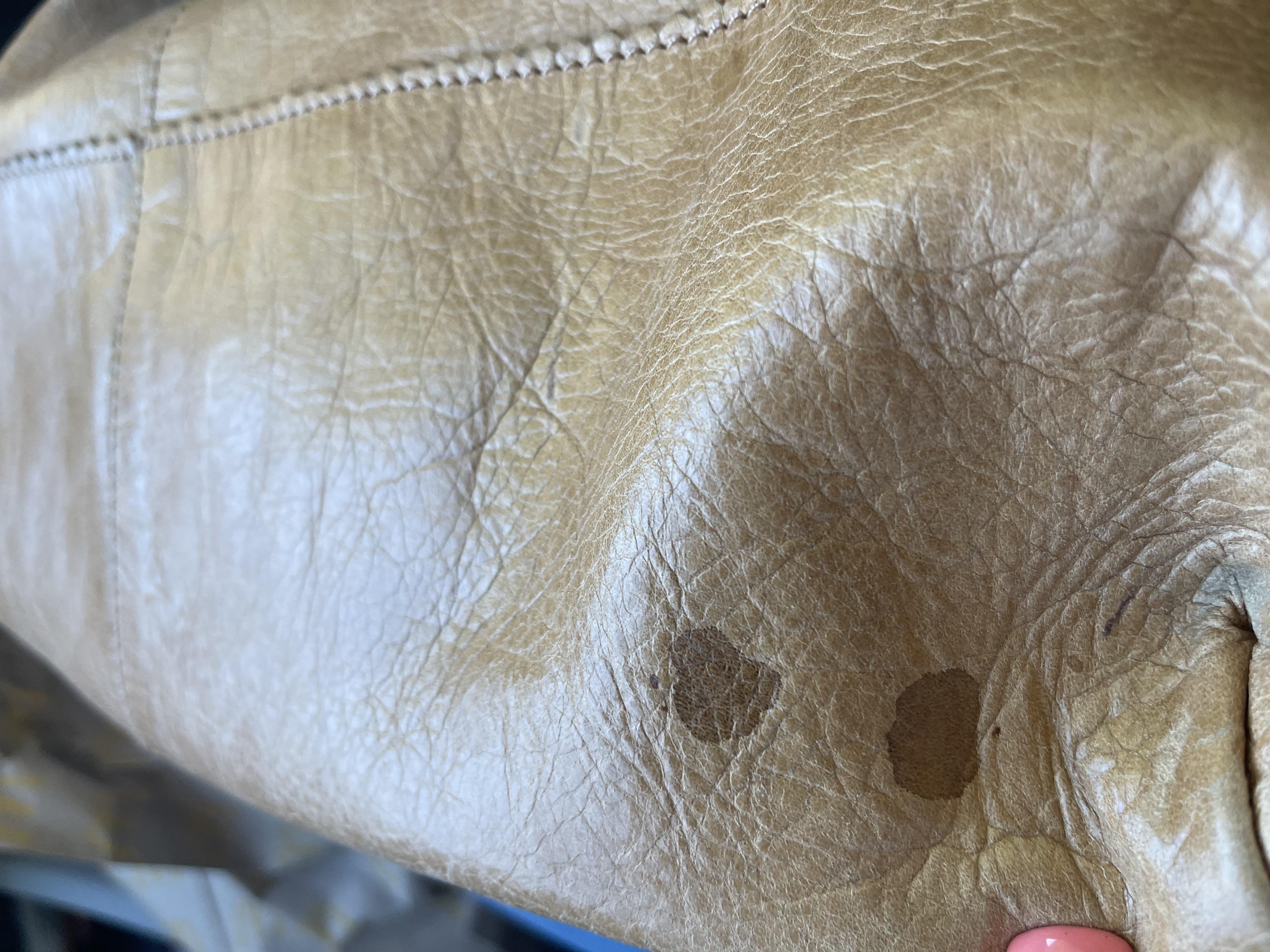 Any suggestions please on how I can clean this off my leather bag