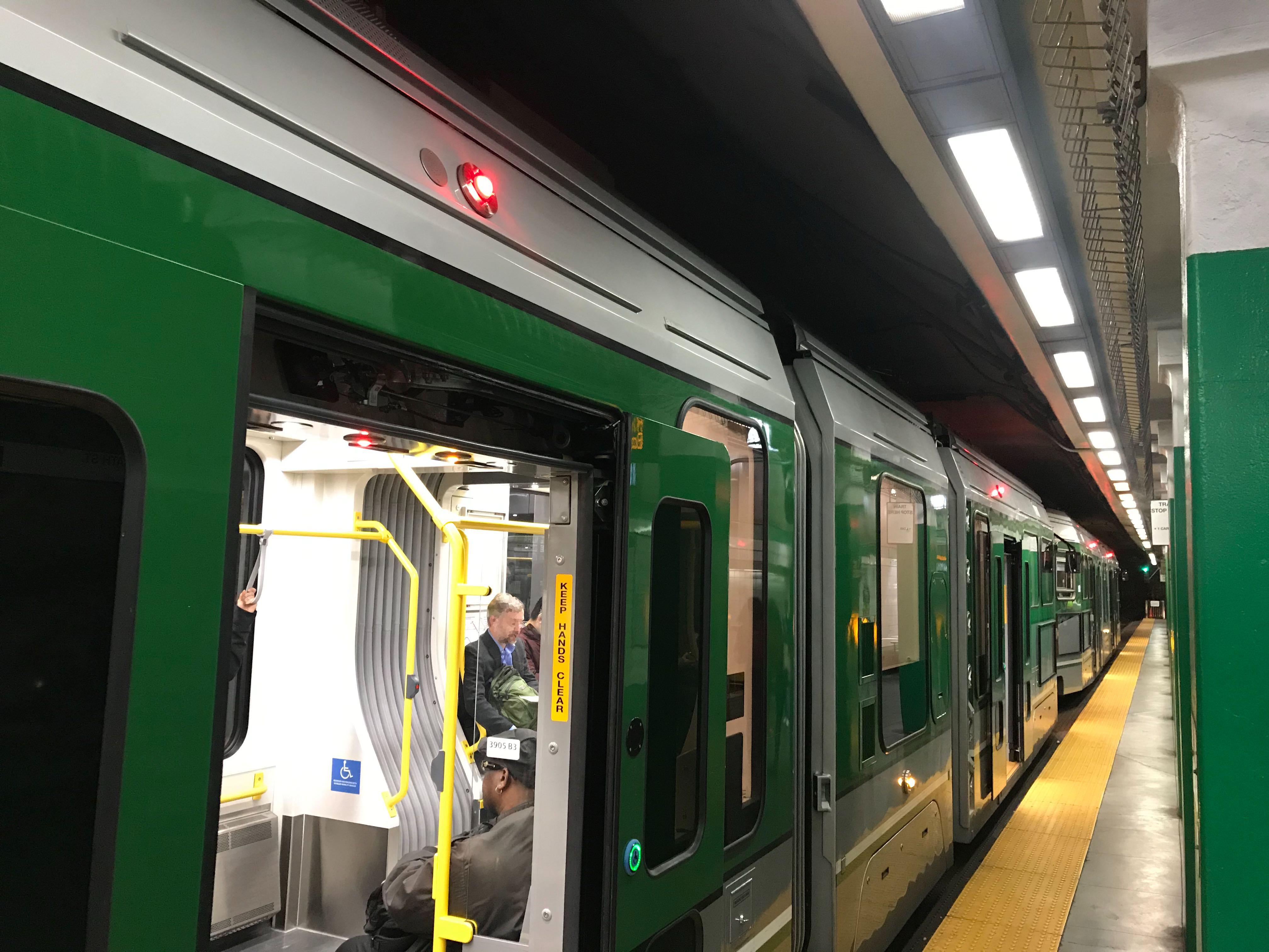 New green line train spotted in the wild today at Arlington Station r