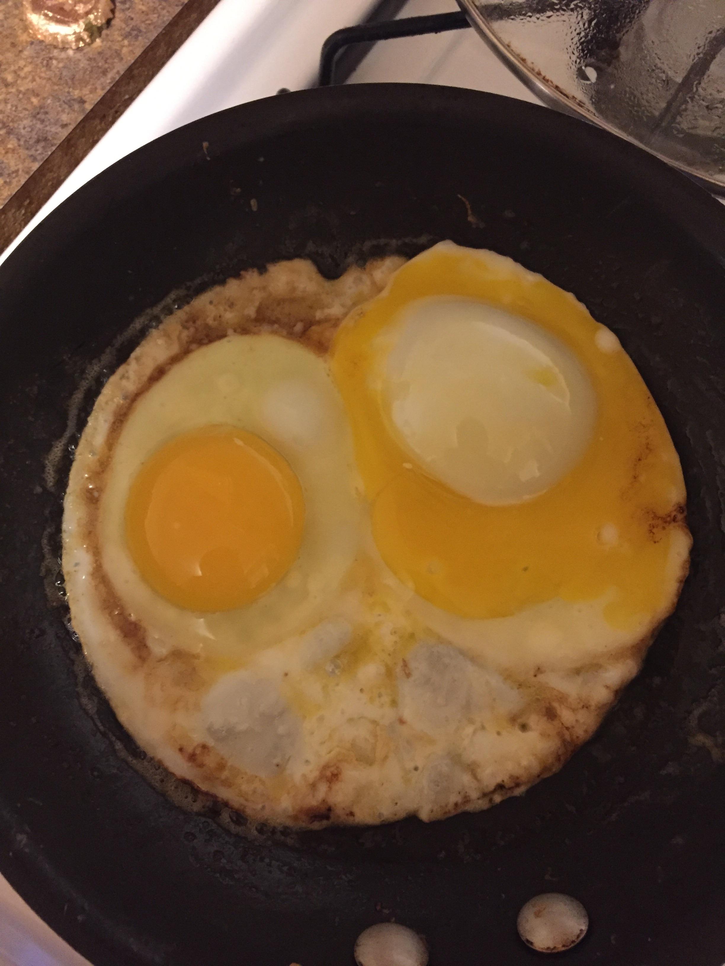 One of my fried eggs busted and inverted the yolk and white part. pics