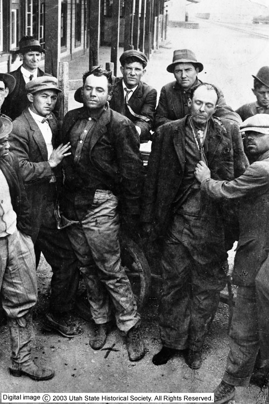 The bodies of bandits Ben Kilpatrick and "Ole Buck", propped up for the