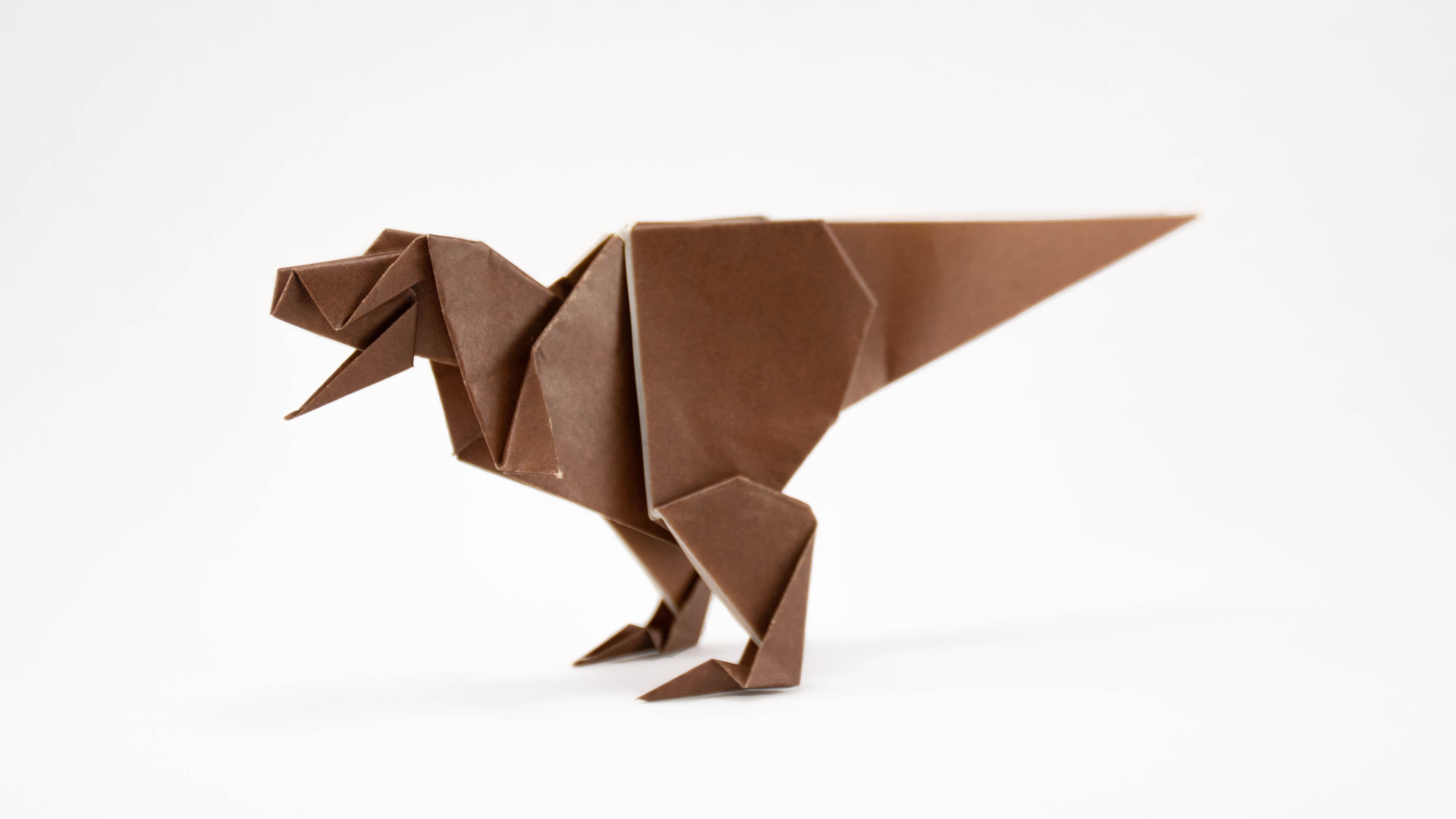 I love making dinosaurs out of paper. Here is an origami TRex I folded