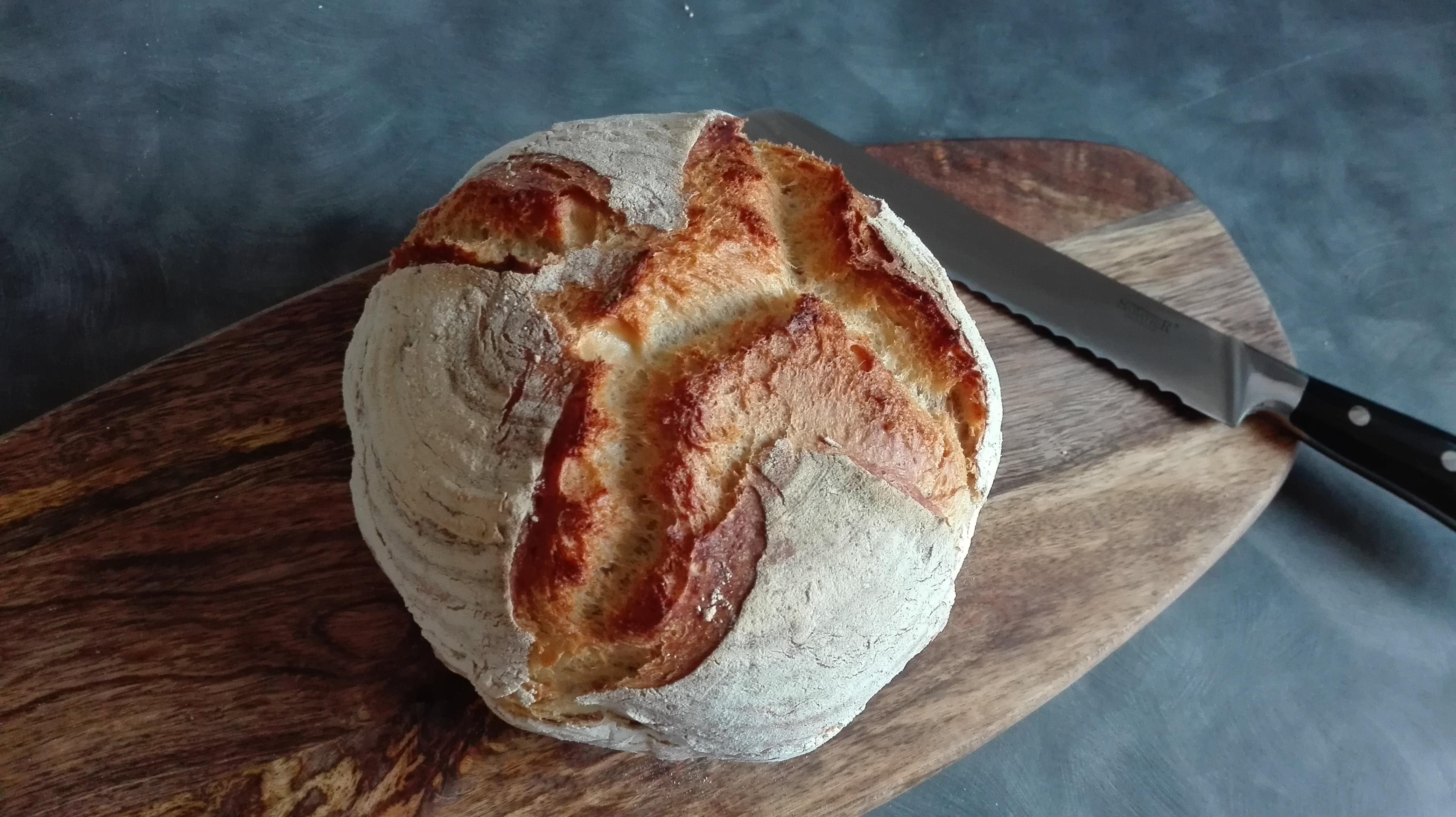 French boule, baked in a dutch oven. Made loads of cracking noises when
