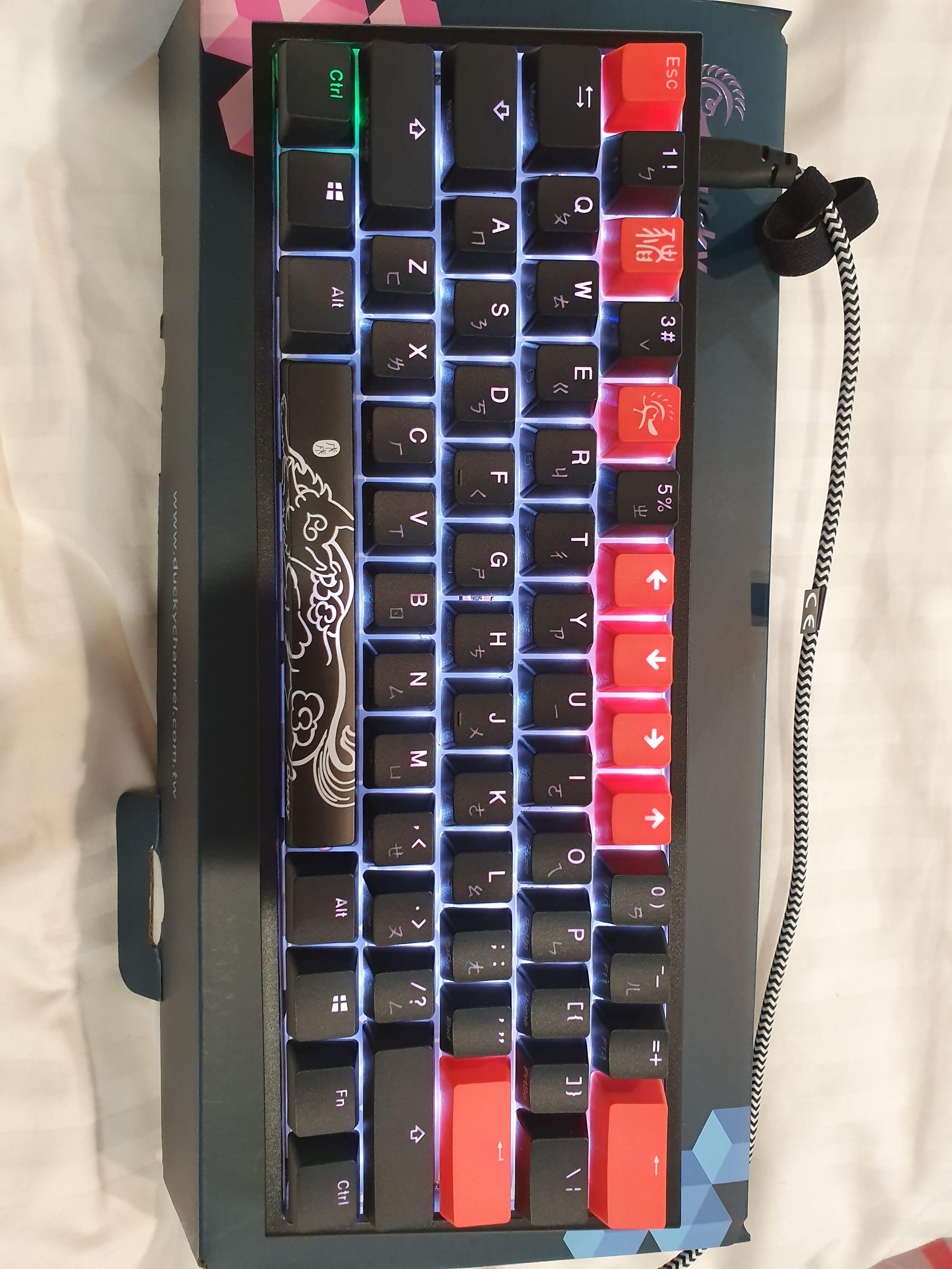 My Ducky One 2 Mini's 'ctrl' key is stuck on the color green any advice