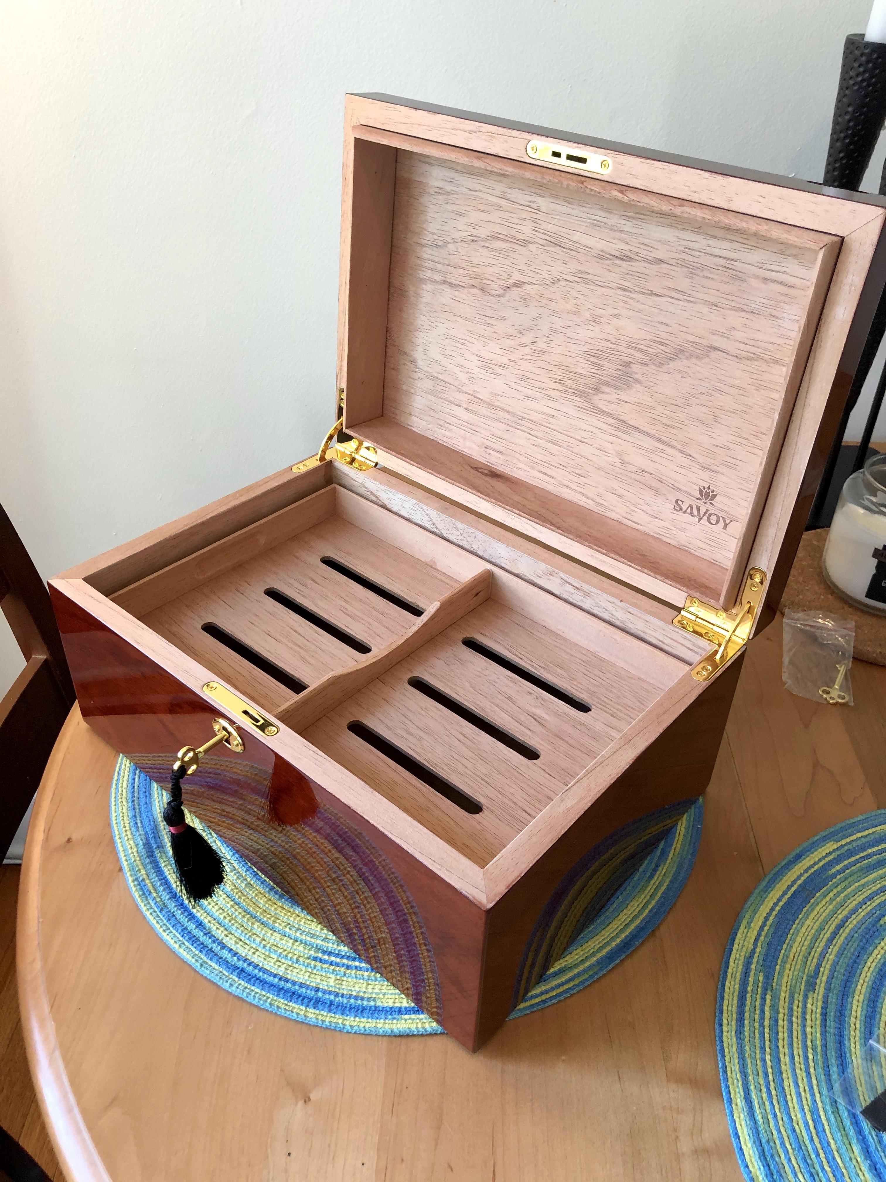 Upgraded my humidor today with room to grow seasoning process has