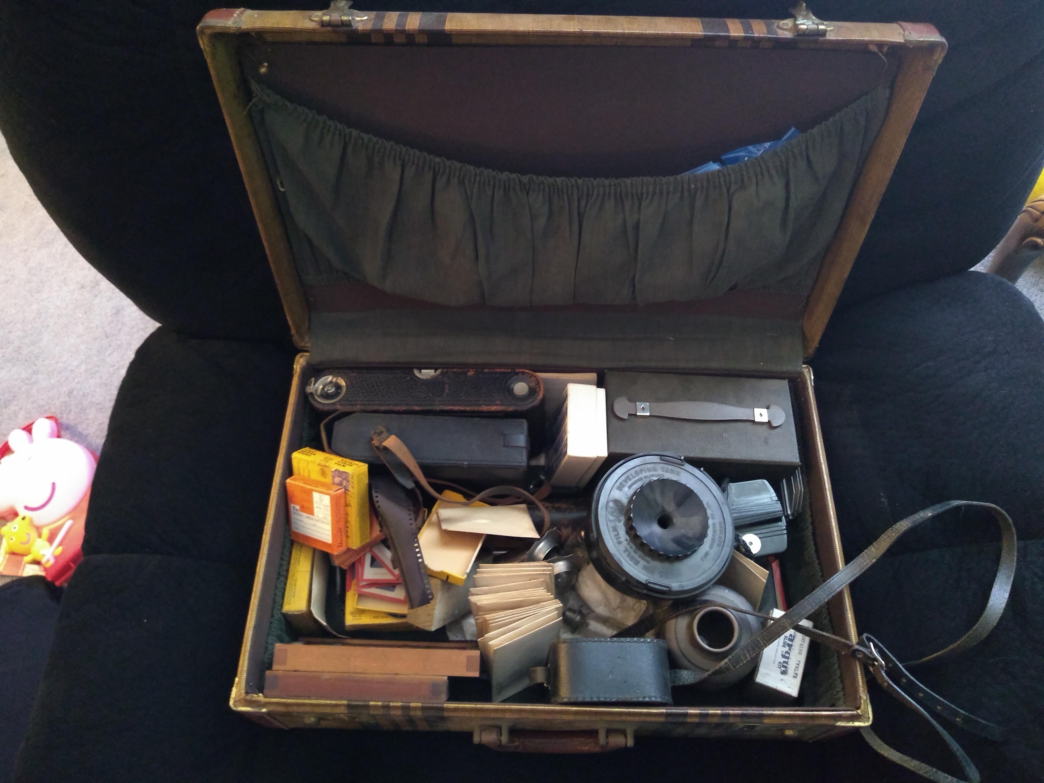 A suitcase full of vintage camera equipment. Going to go through it