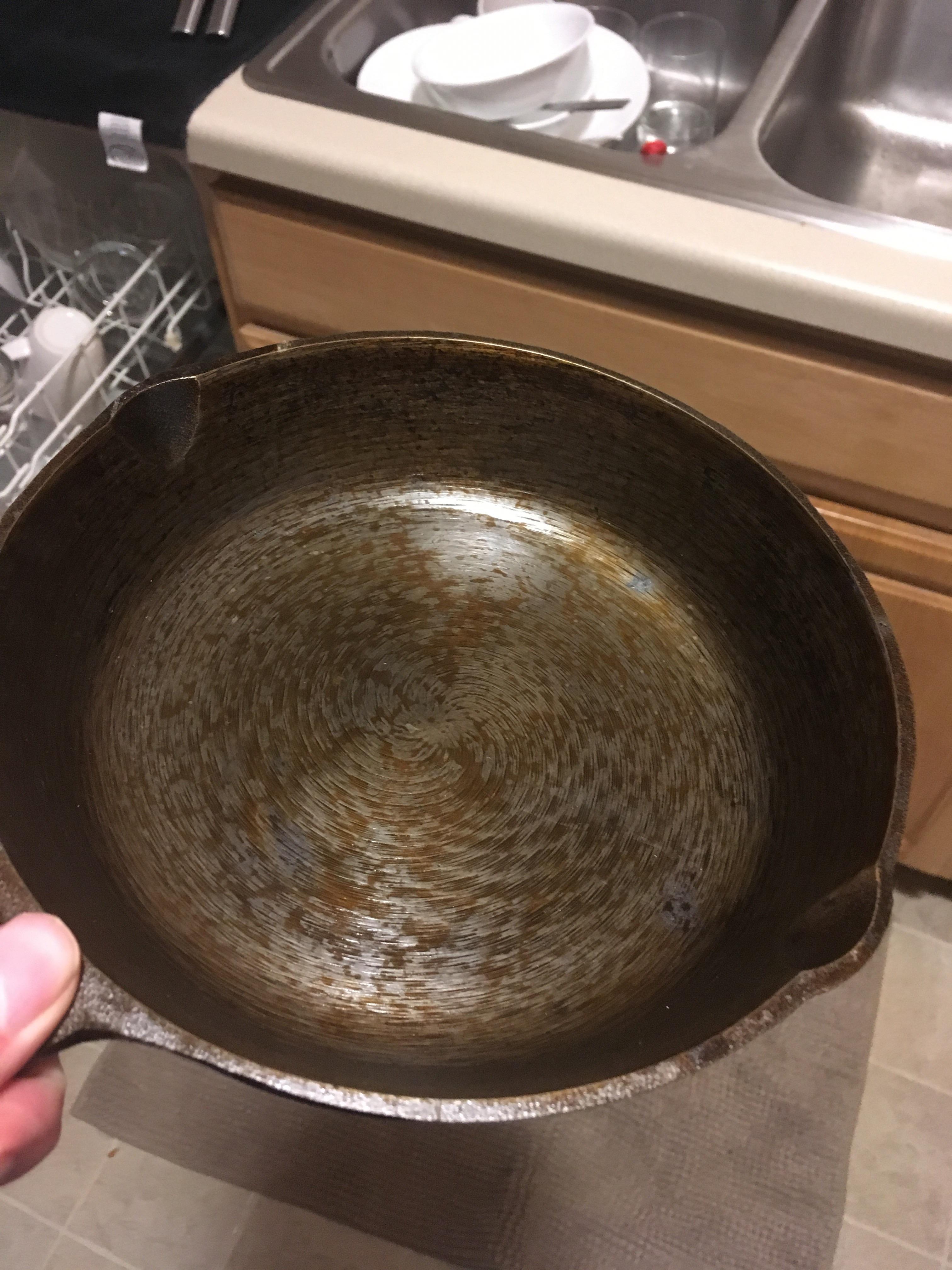 How do you clean up these spots on this cast iron pan? r/castiron