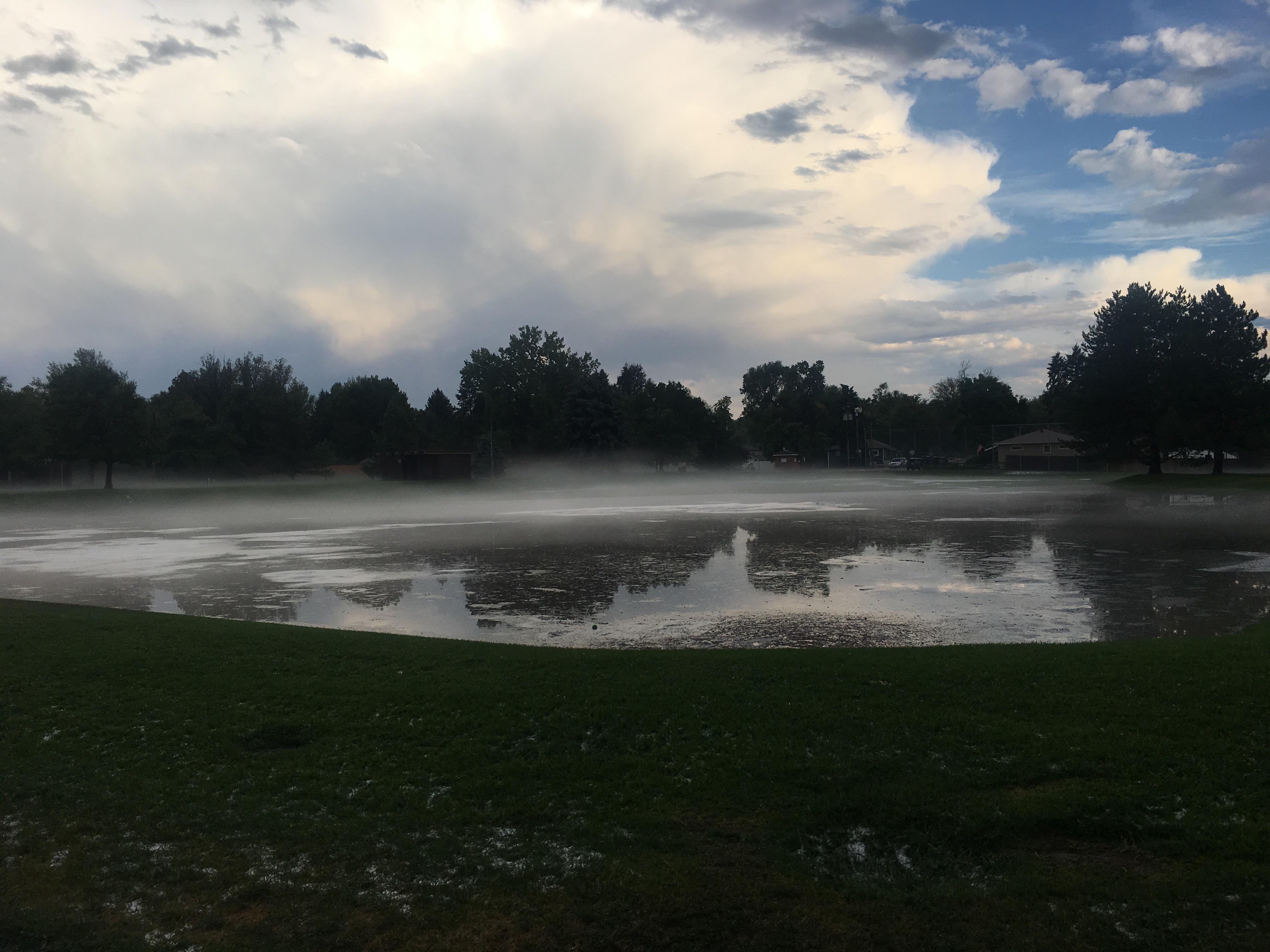 Rained so much the other day, Bates Park turned into Bates Lake. r/Denver
