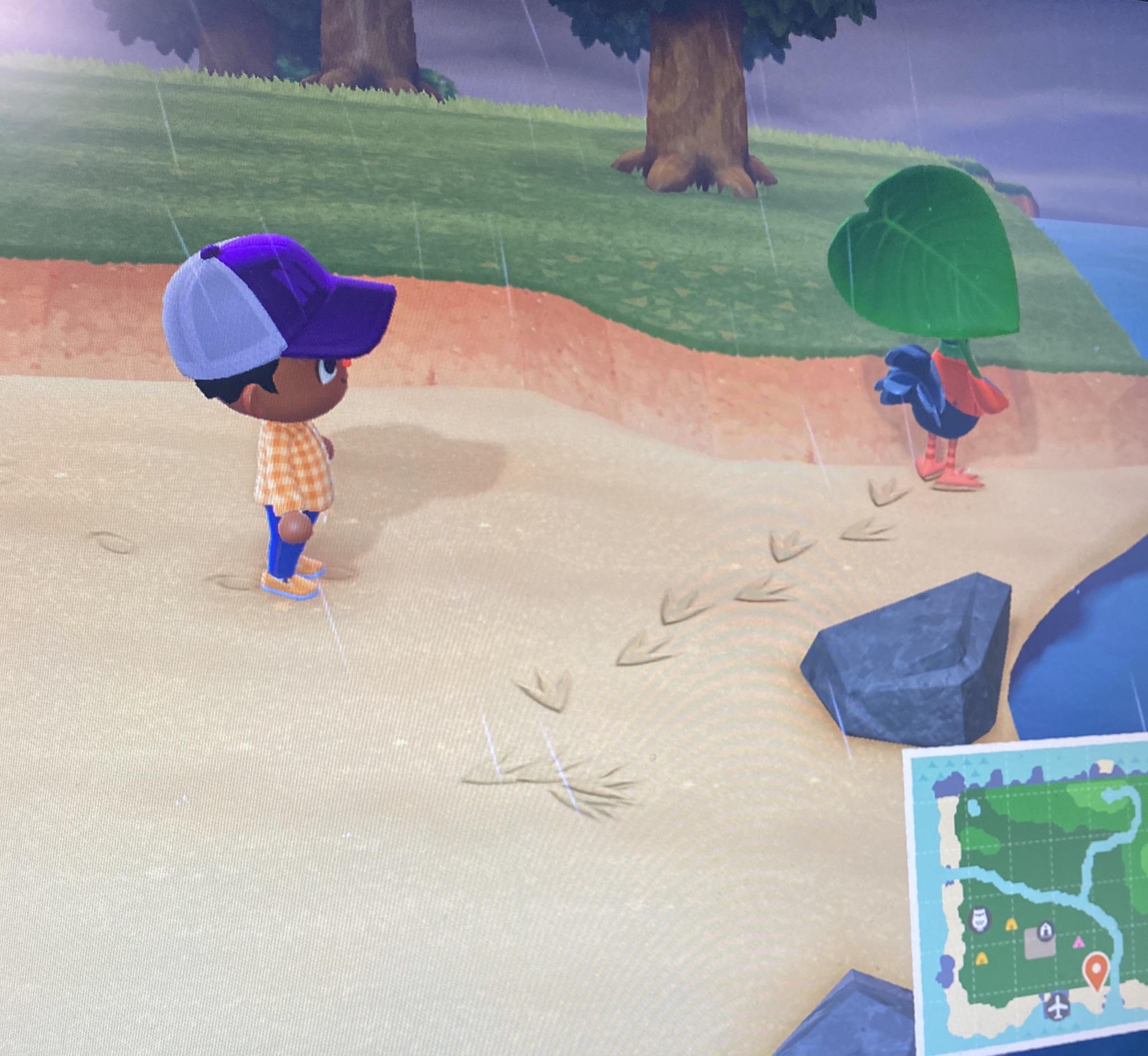 In Animal Crossing New Horizons, the footprints of a villager in sand