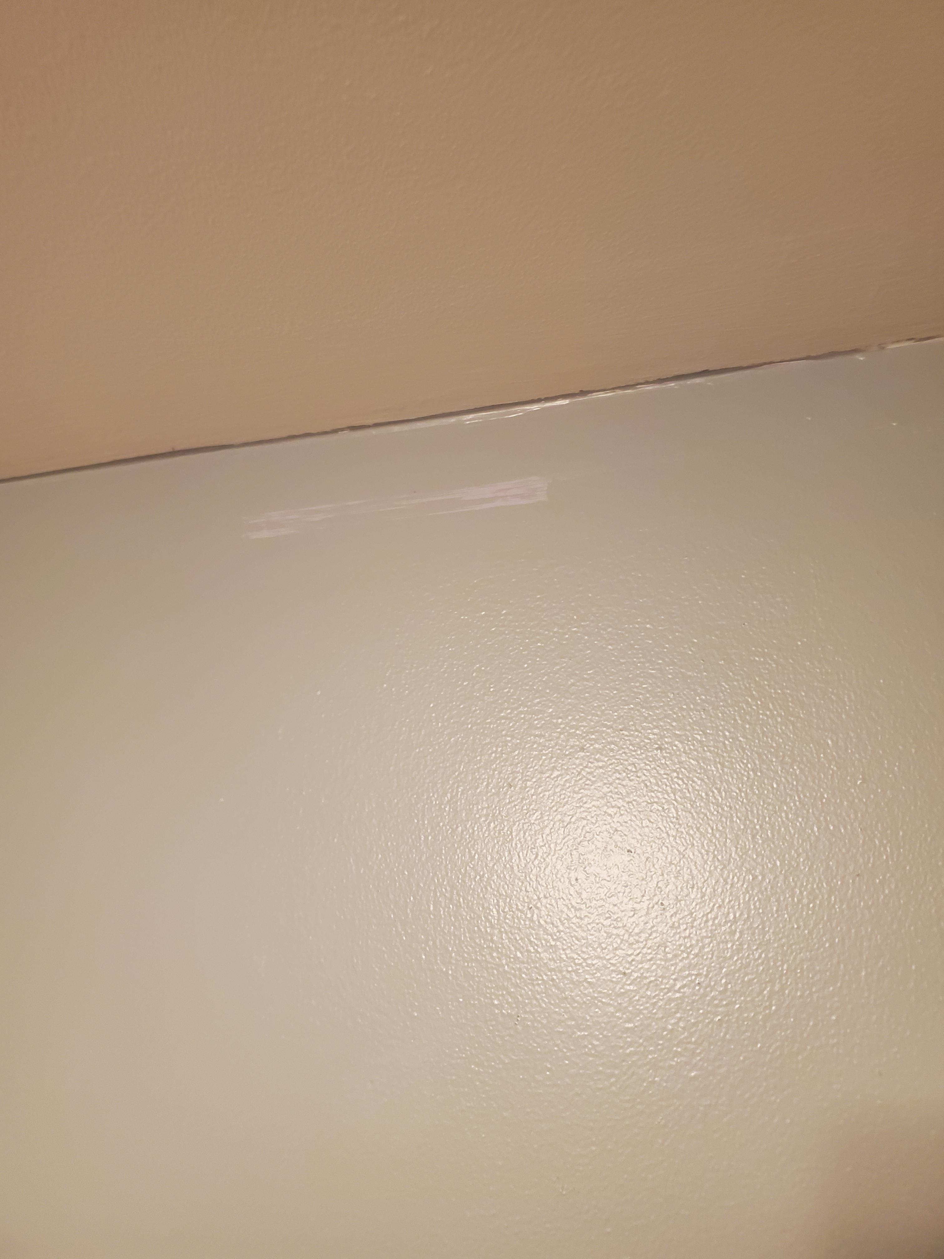 Old paint started to bleed through new paint even though the new paint