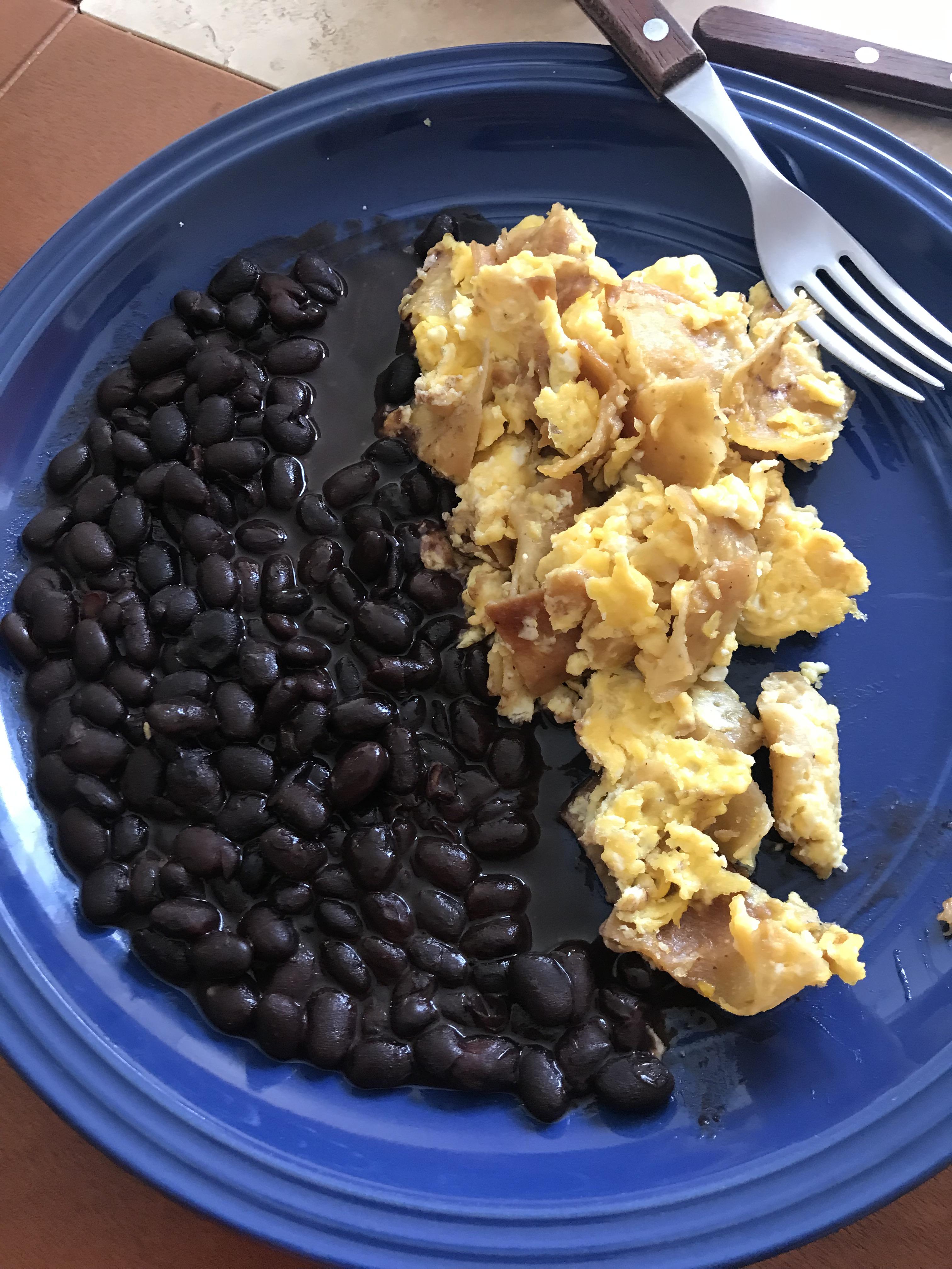 Slow cooked black beans with Mexican Migas con huevo. r/slowcooking
