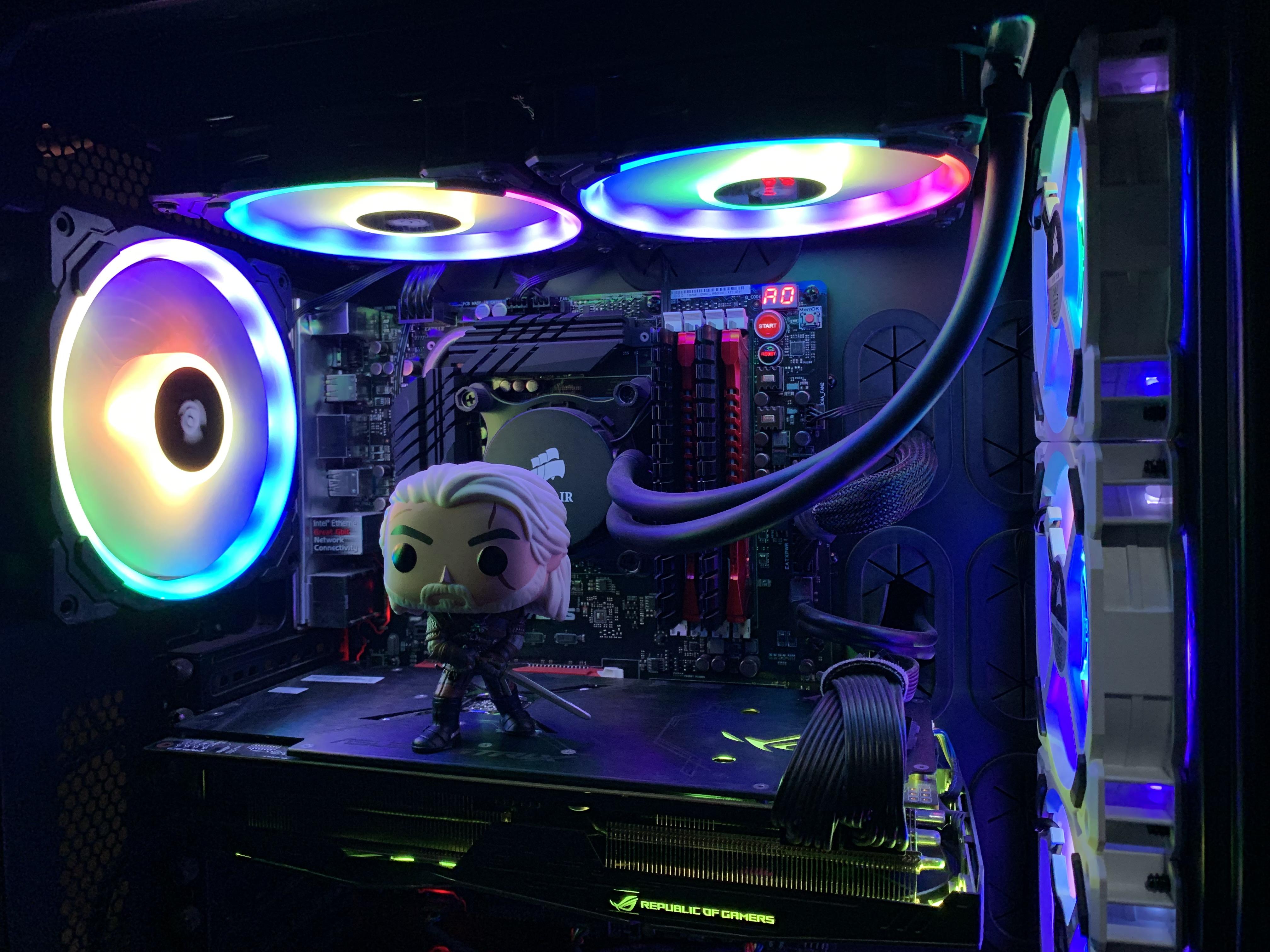 First Funko Pop! Geralt of Rivia guarding my rig while playing The