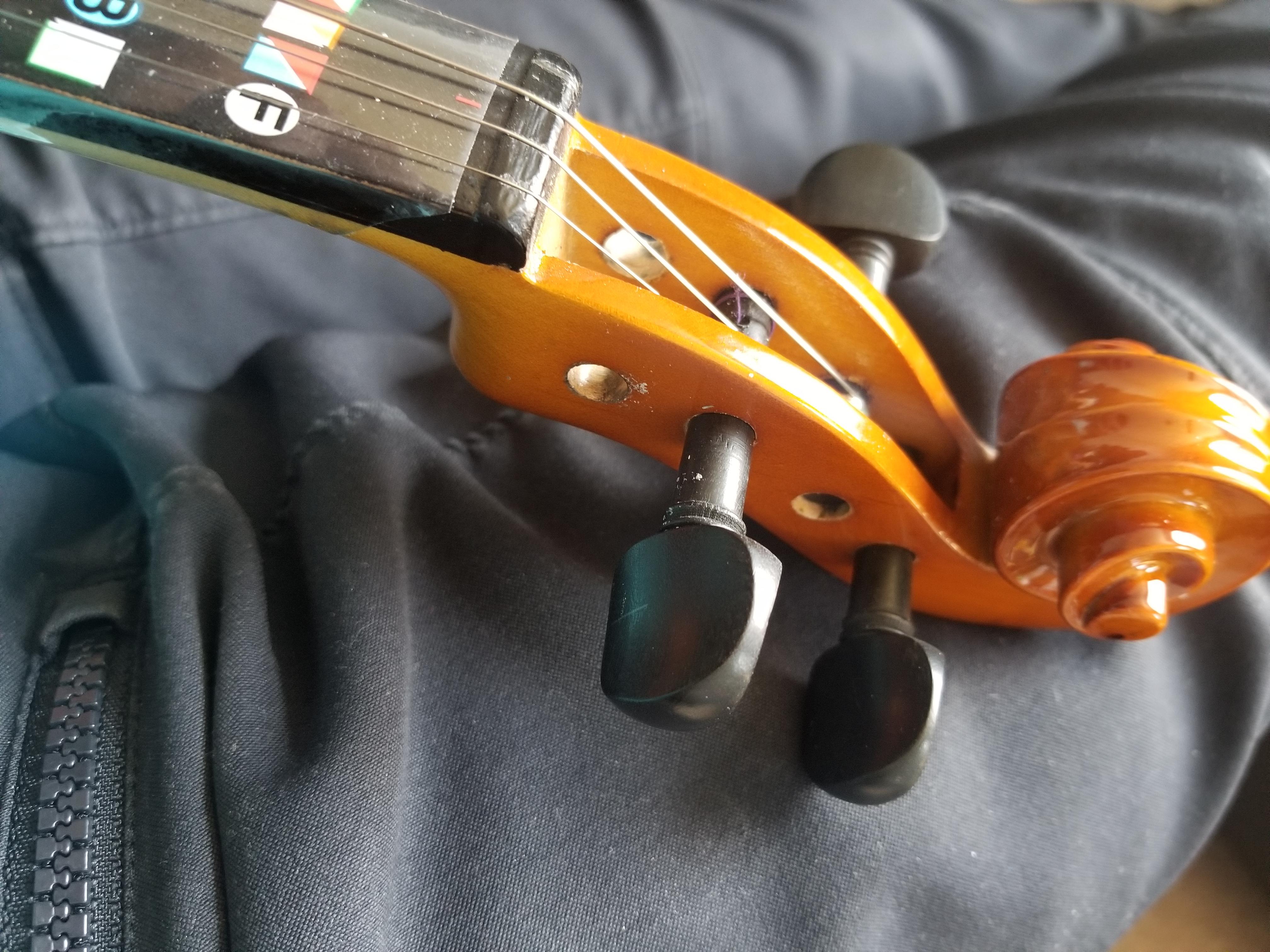 I cant tune my G string because the peg hole is too loose. How much