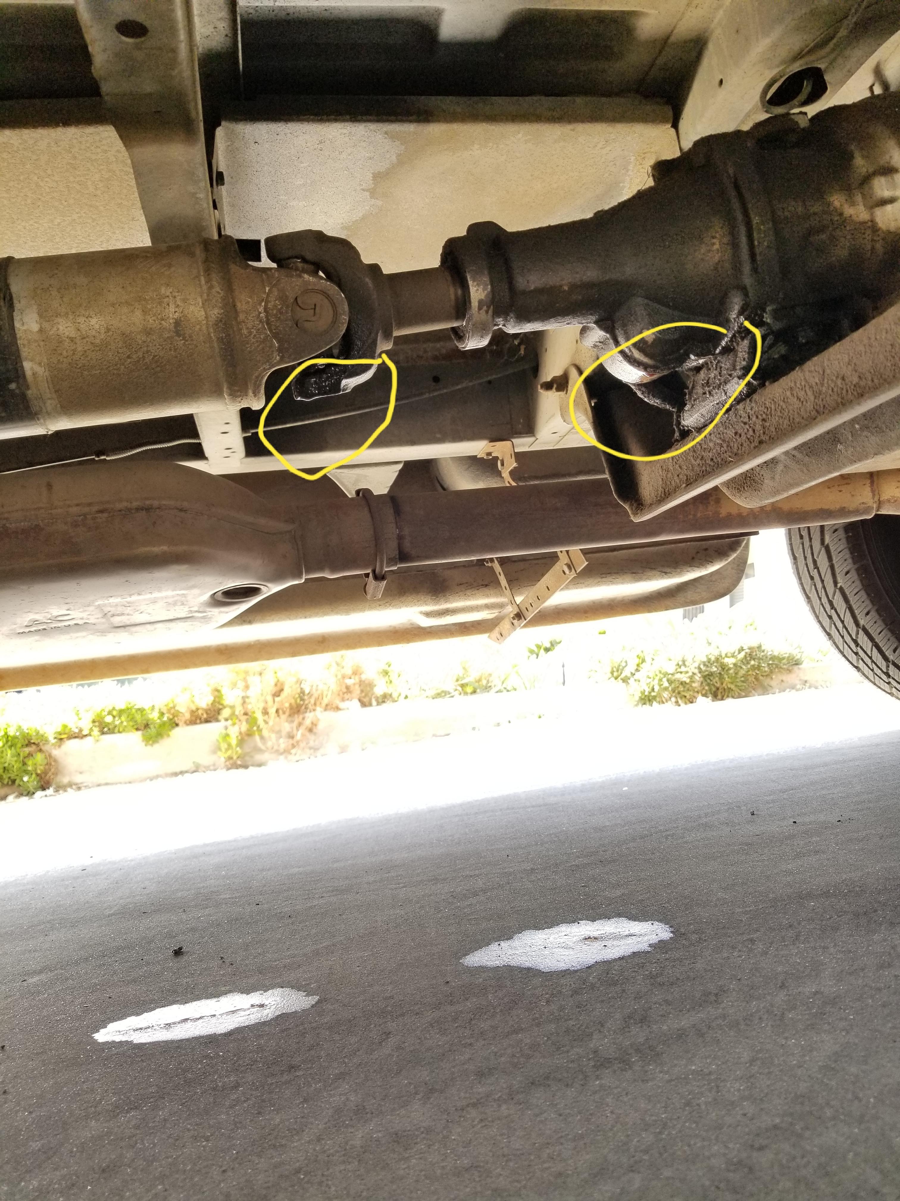 1993 chevy g20 van leaking fluid from two spots. See pic r/MechanicAdvice