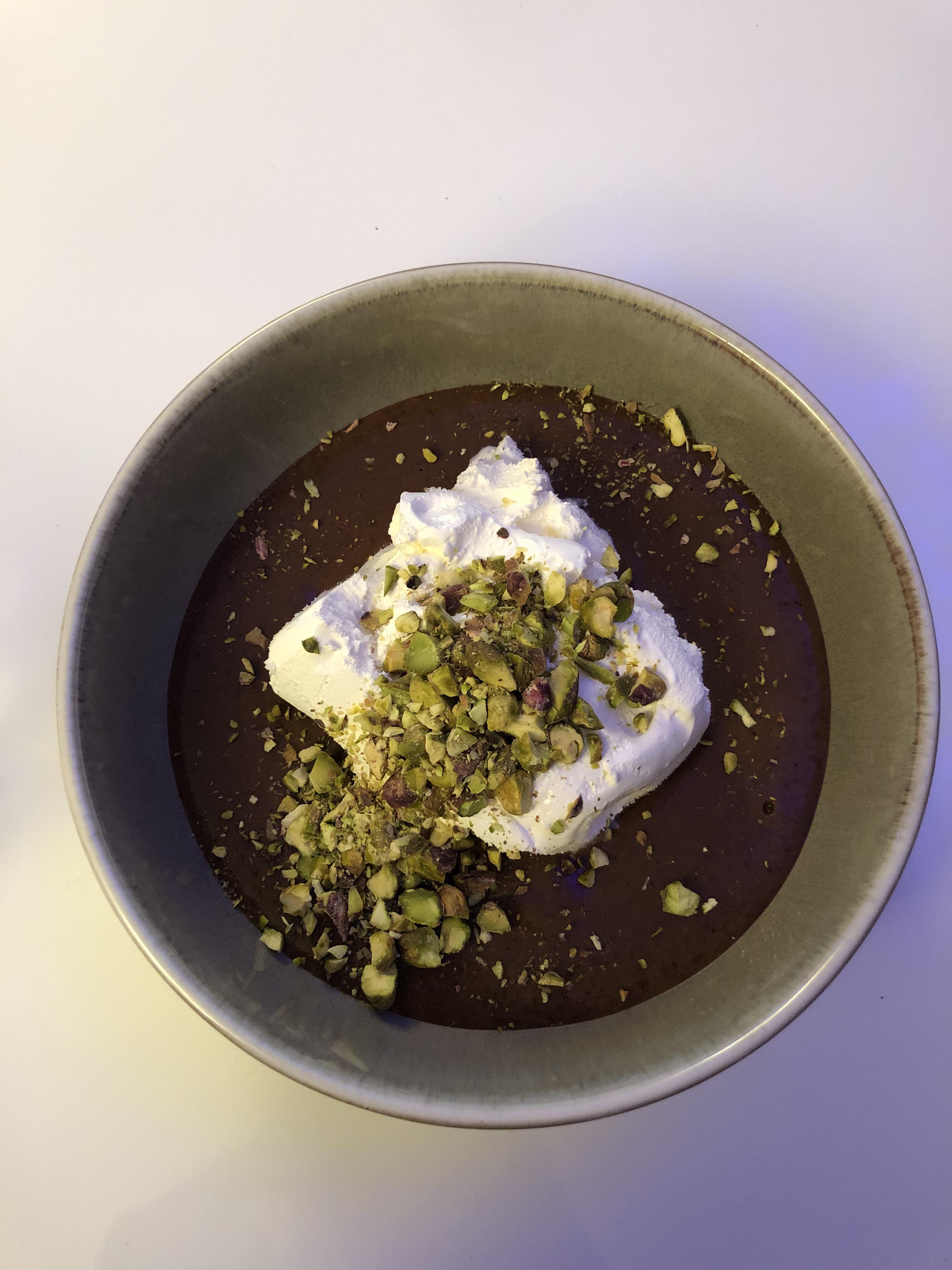 Fat free chocolate jello pudding, with light cool whip and chopped raw