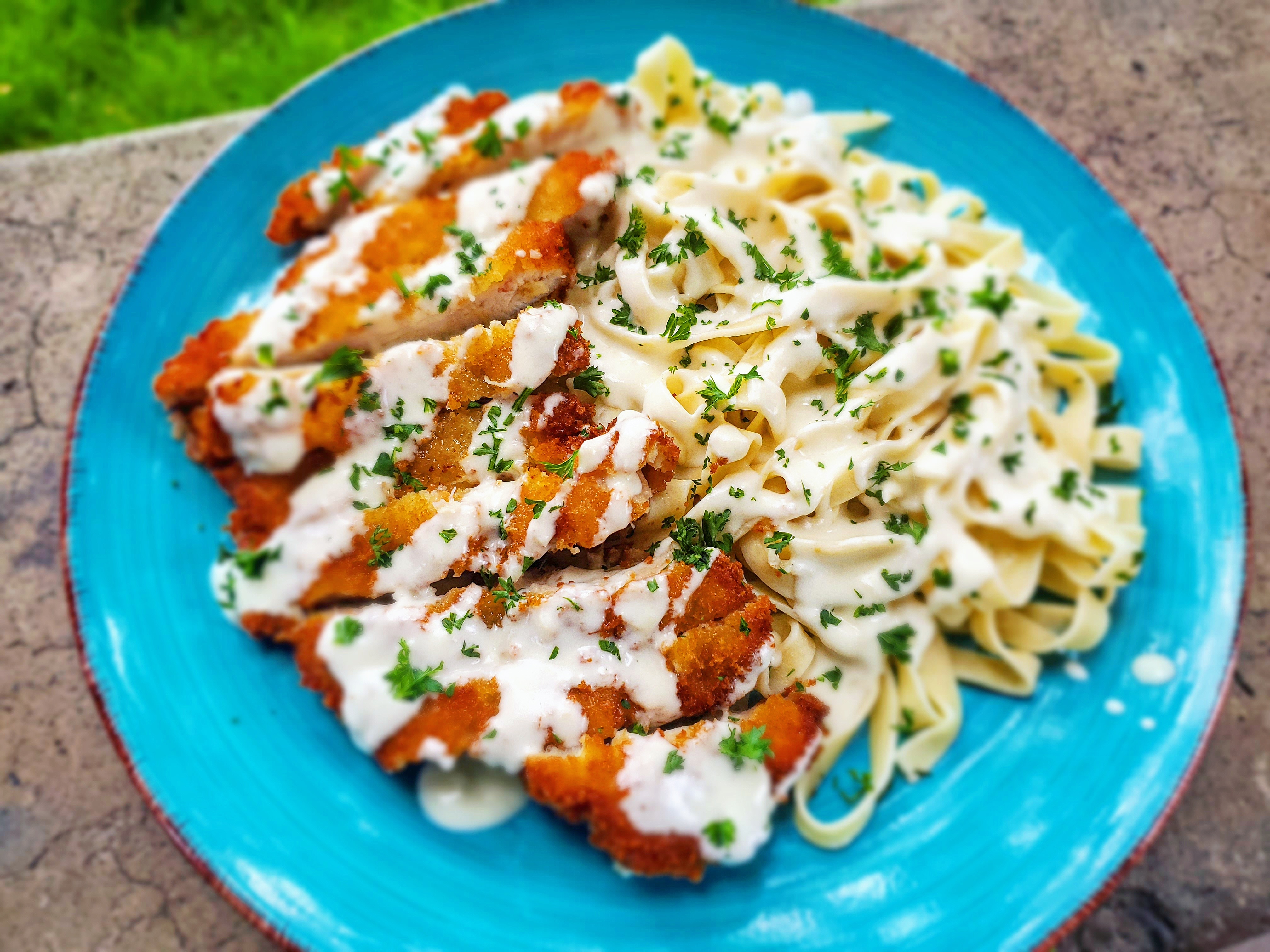 [Homemade] fettuccini alfredo pasta with panko breaded chicken thighs
