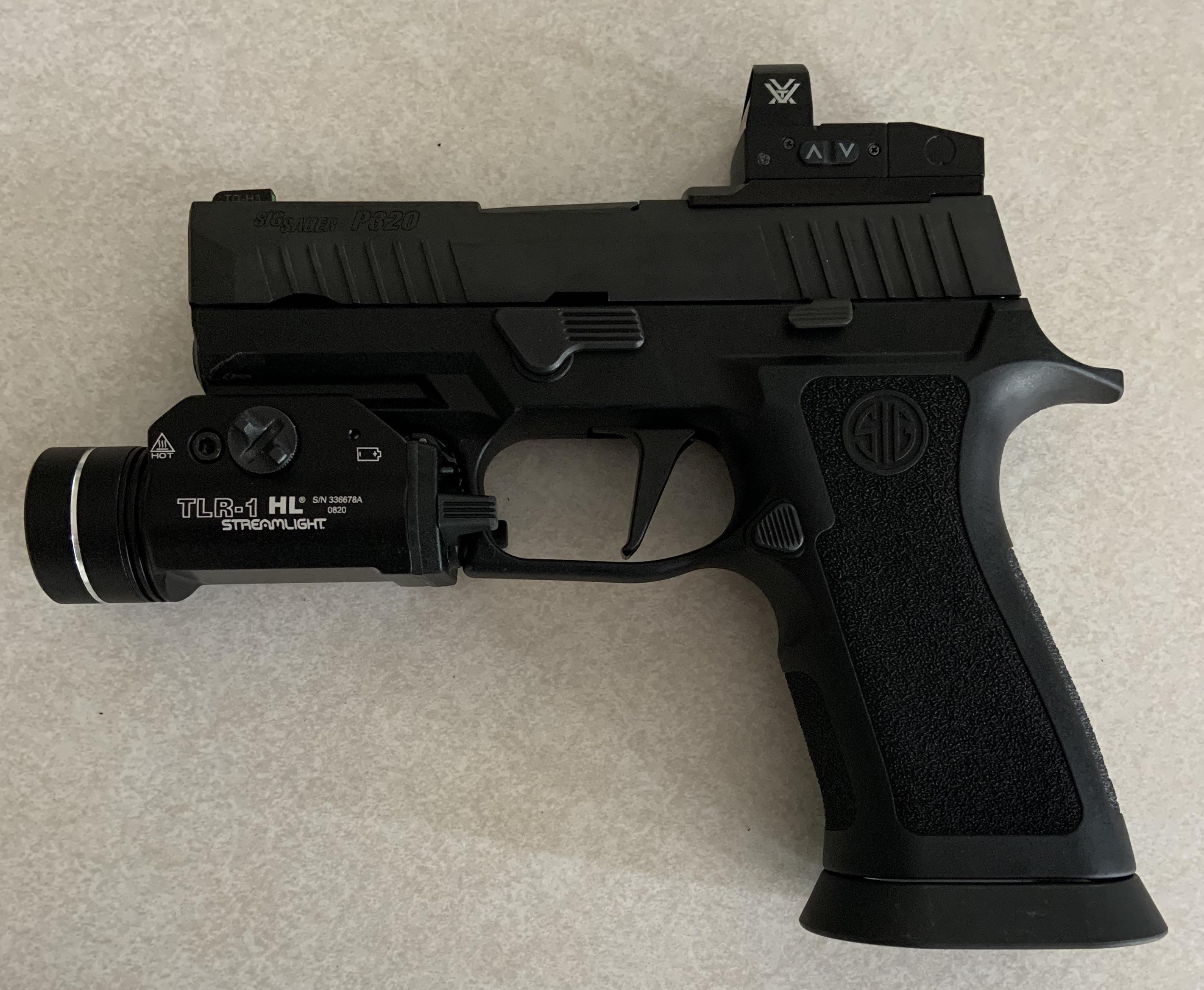 Sig Sauer P320 Slide with a P320 XFive Grip Module I would