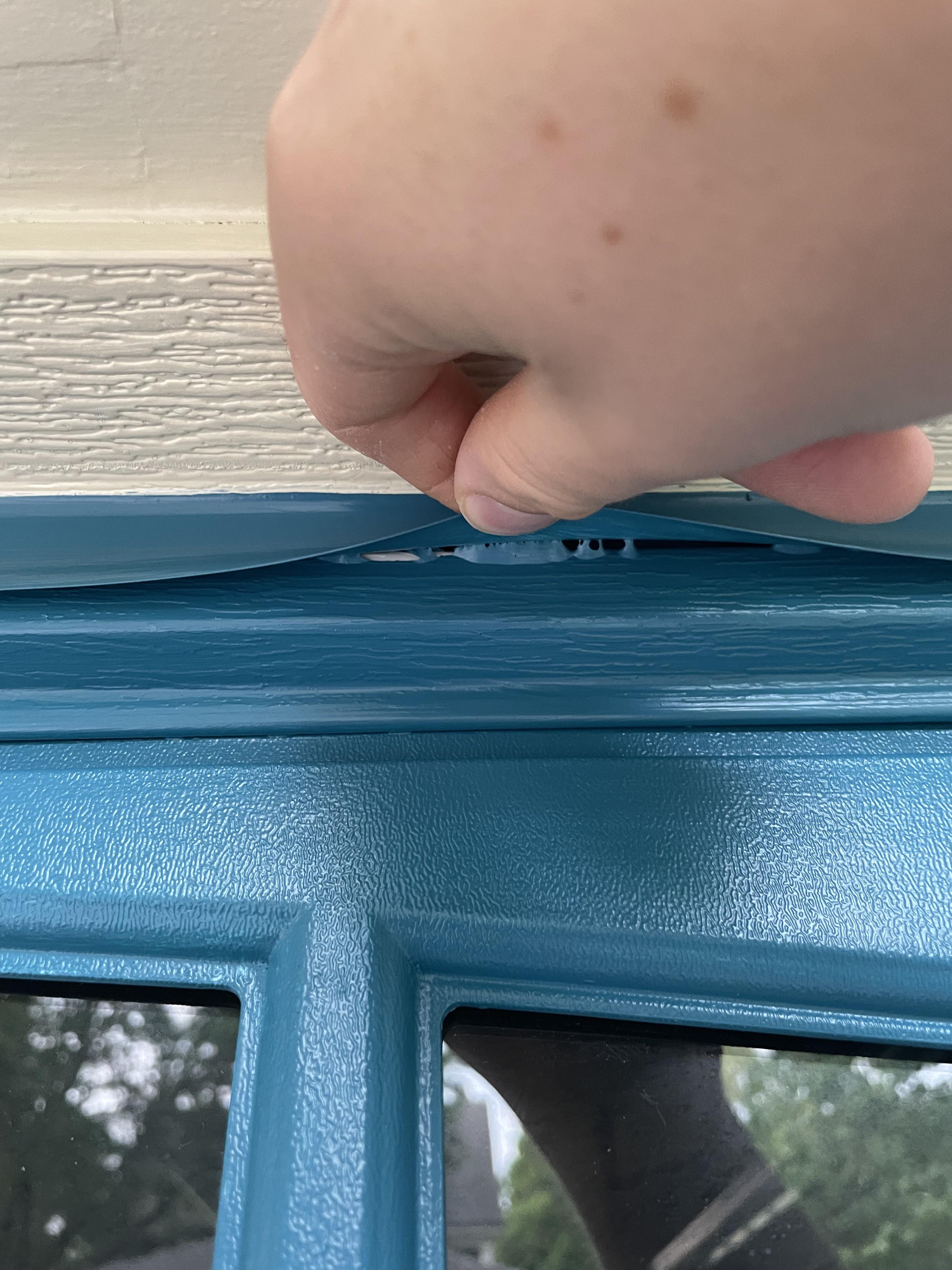 New door painted and the weather strip keeps sticking. Replaced weather