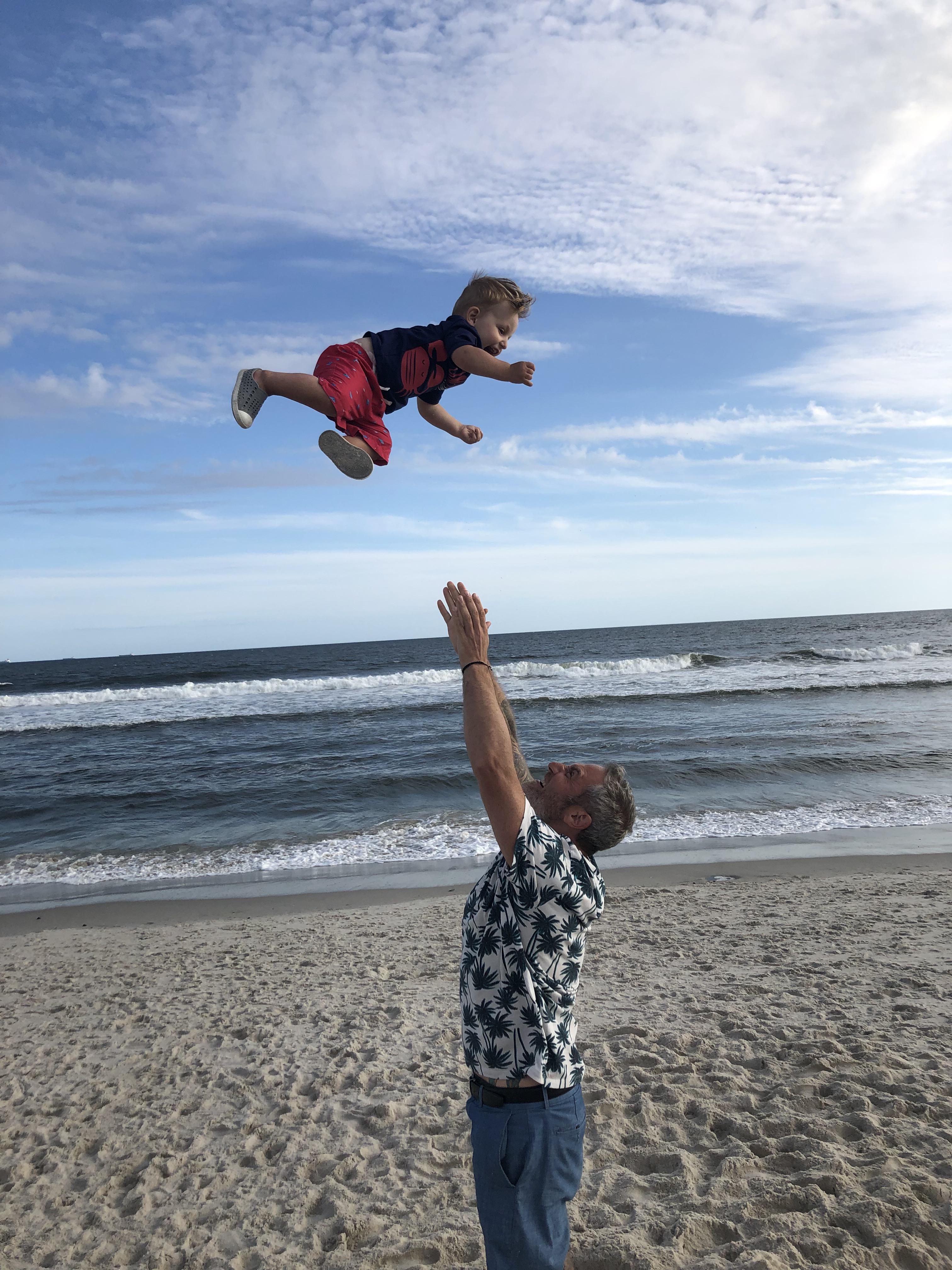 PsBattle boy being thrown in the air