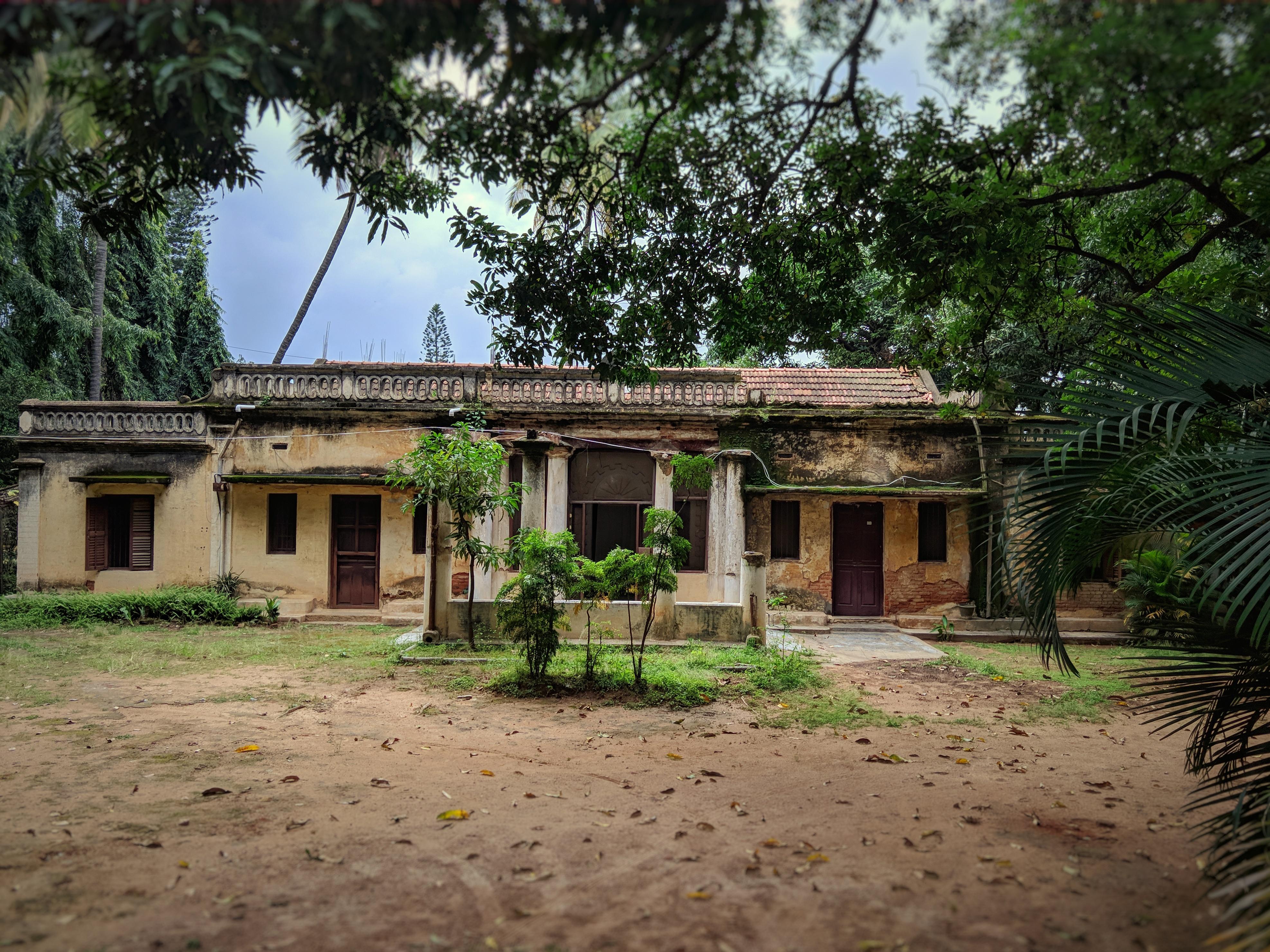 A very old house on church street, around 100 m from a Starbucks. r