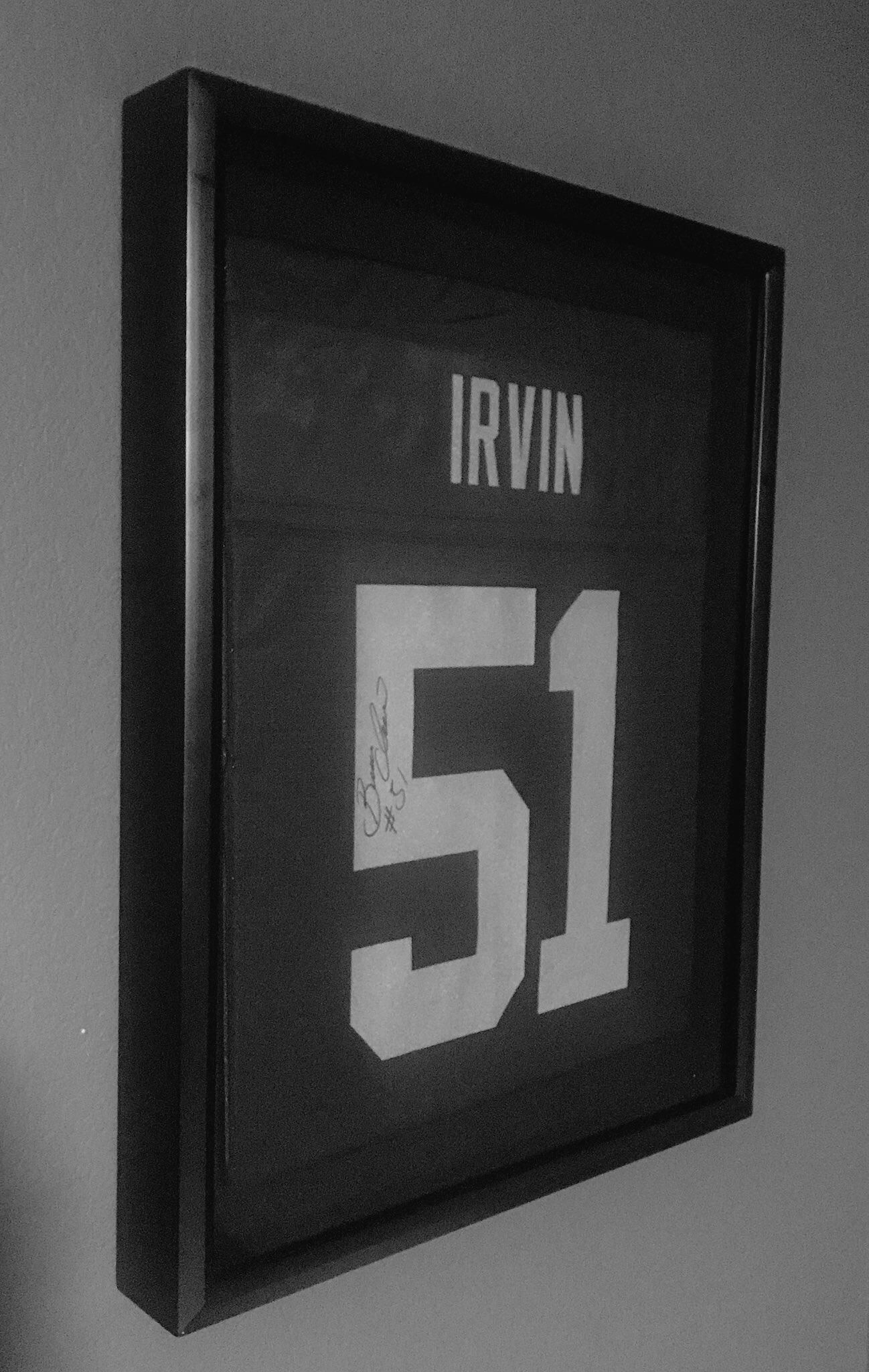 Framed my first signed jersey by Bruce Irvin in a shadow box. r