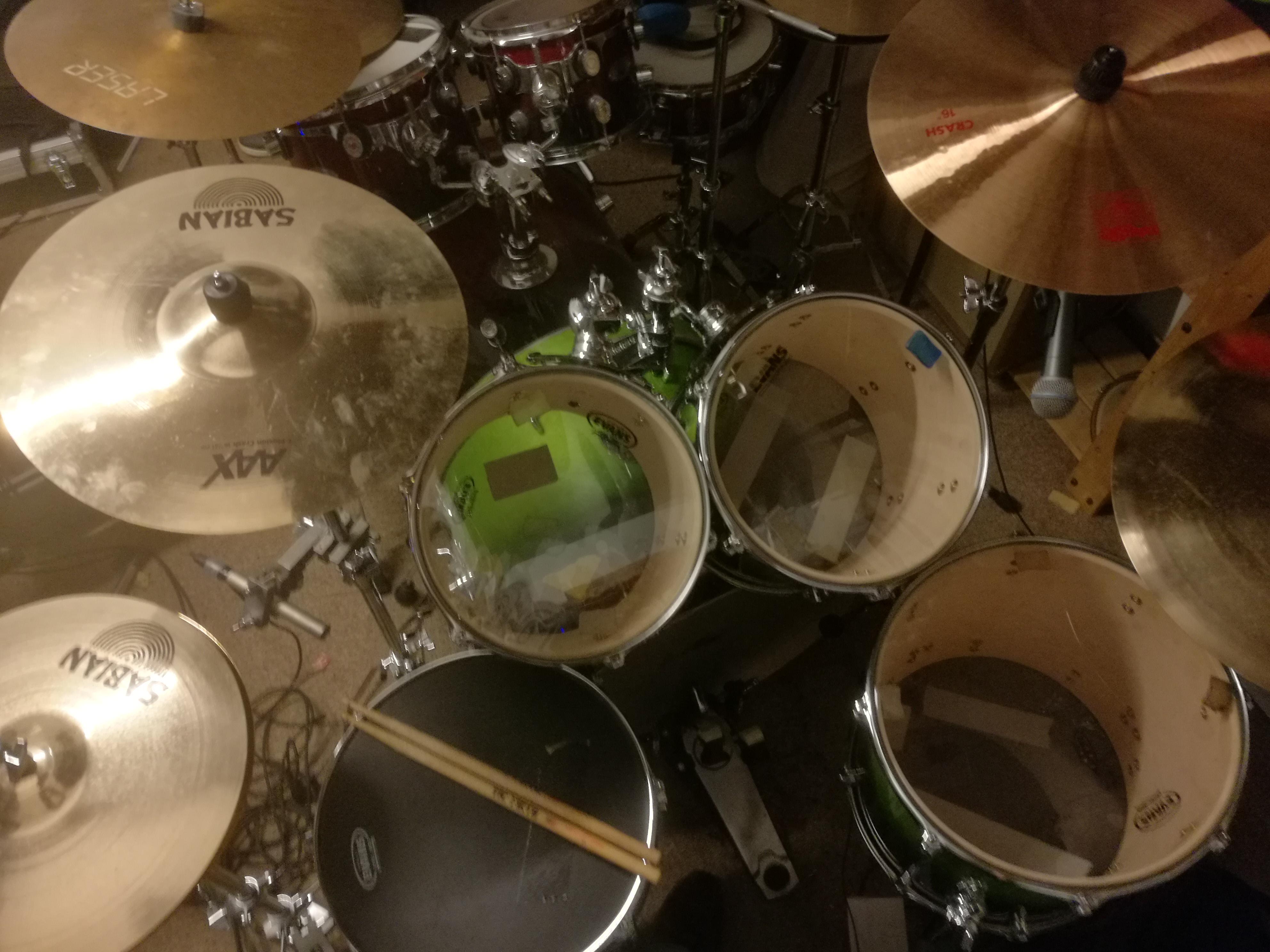 New drum heads applied, mics positioned and tested, ready for the