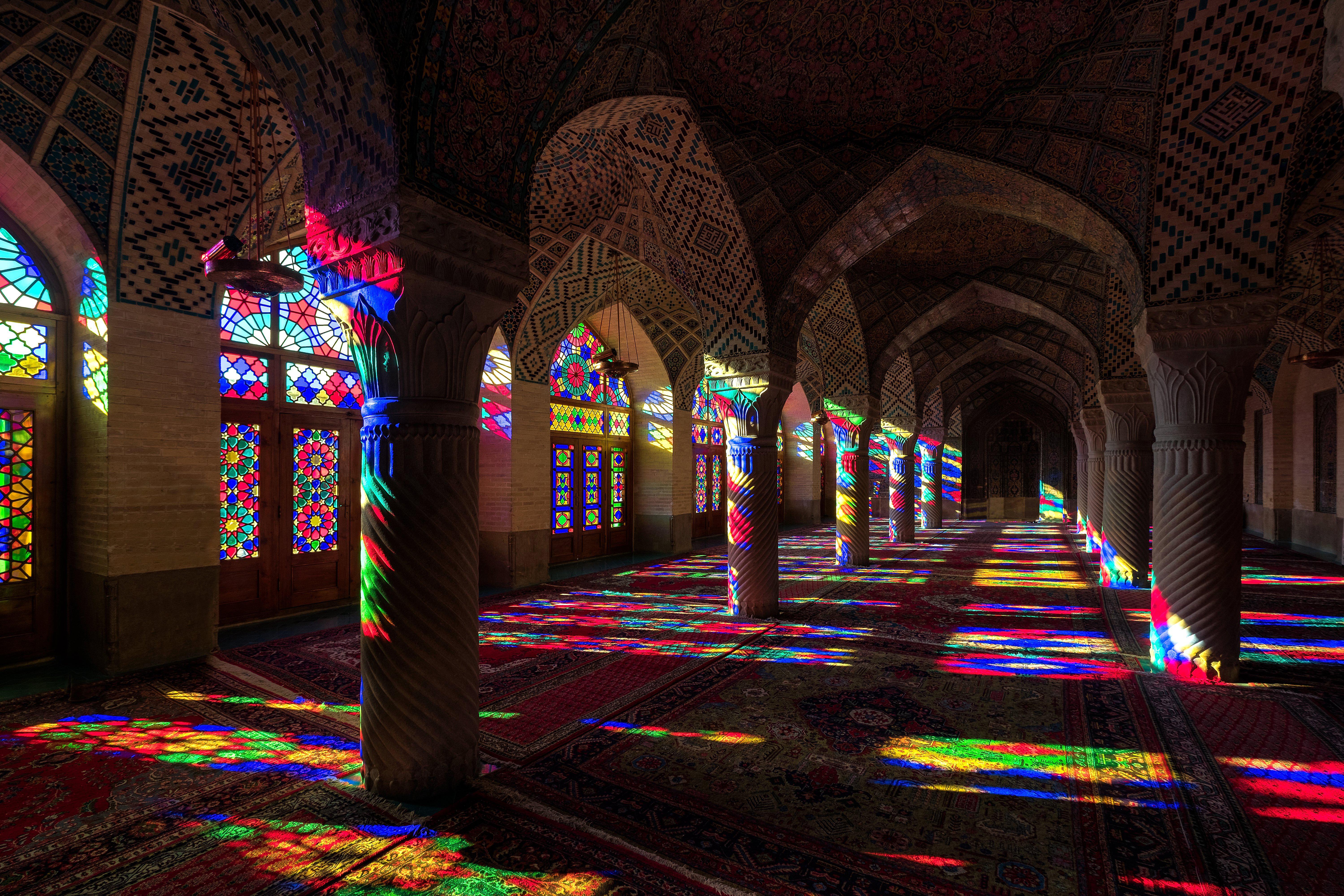 Lighting reflected through the stained glass windows inside the Nasir